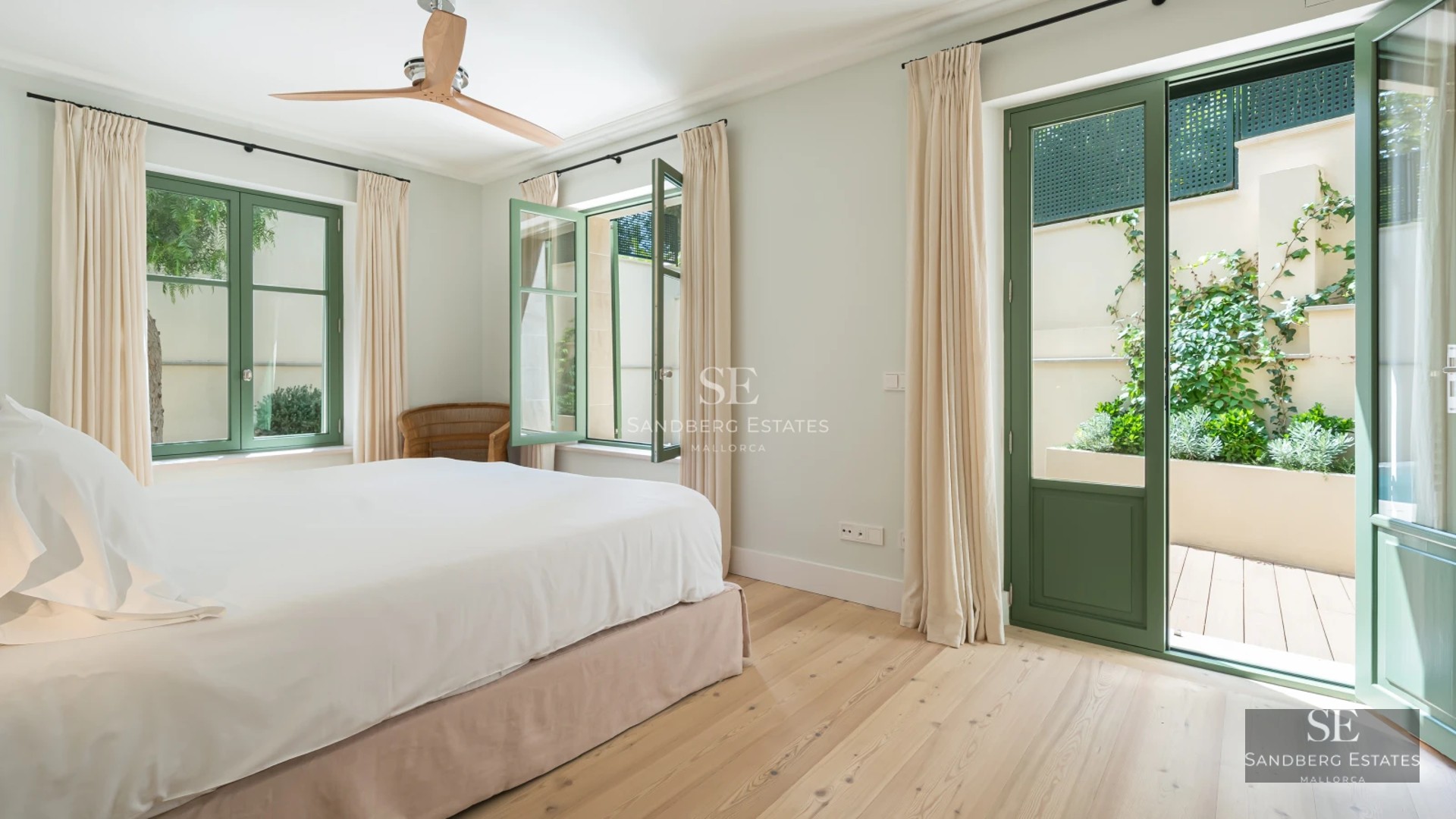 Exterior view of modern villa featuring an infinity pool. Minimalist design, large windows, and manicured landscaping. Luxury and comfort.