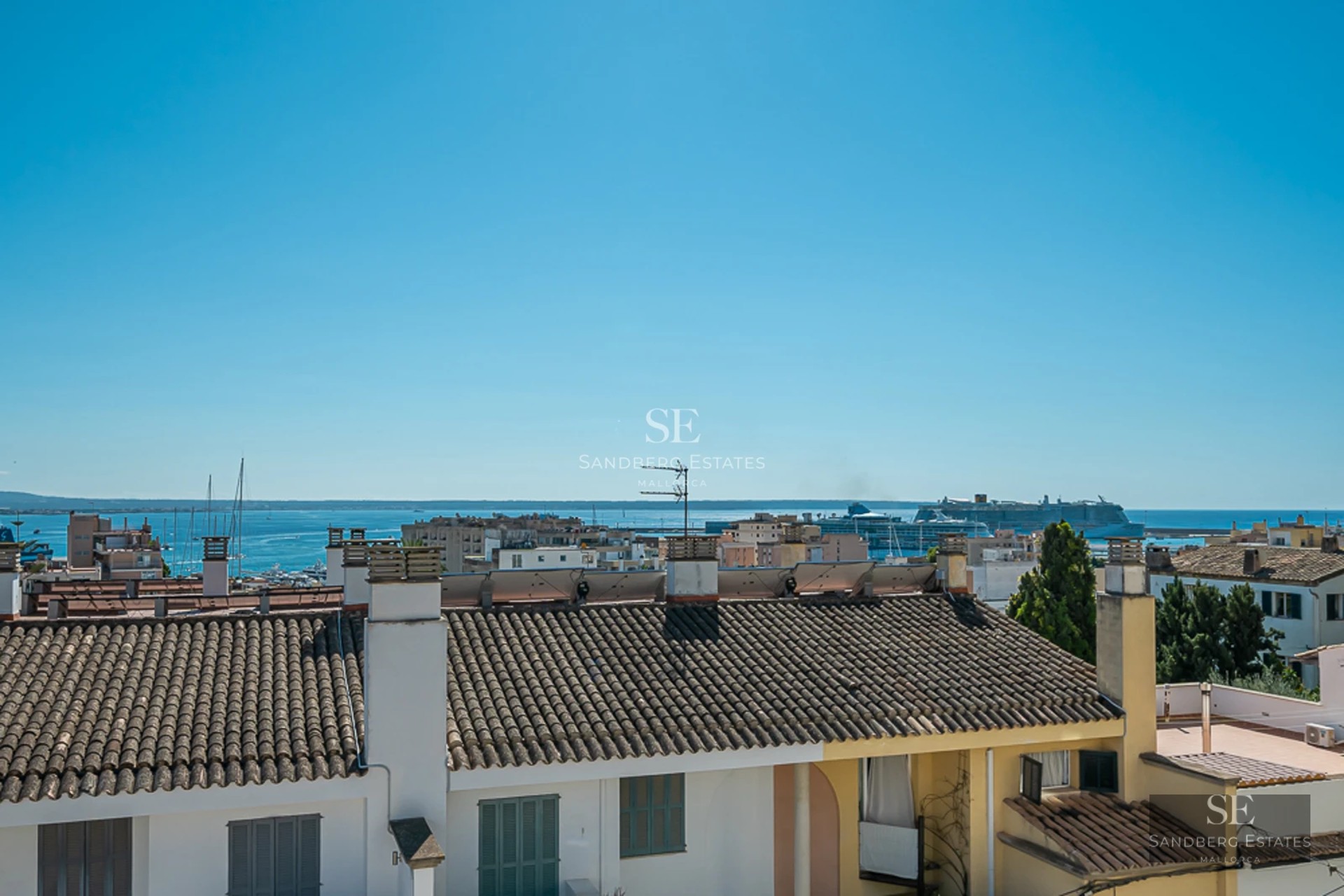 Exterior view of a modern villa with a pool and garden. Minimalist architecture, large windows, and elegant landscaping.