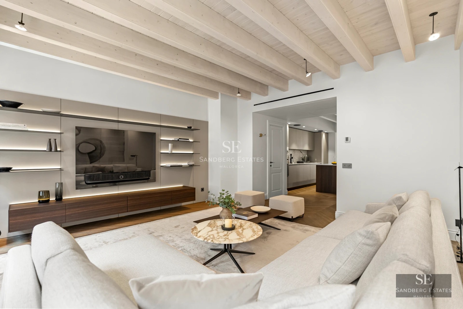 Spacious terrace with infinity pool and sea view. Modern architecture with glass fronts and minimalist design. Ideal for relaxation.