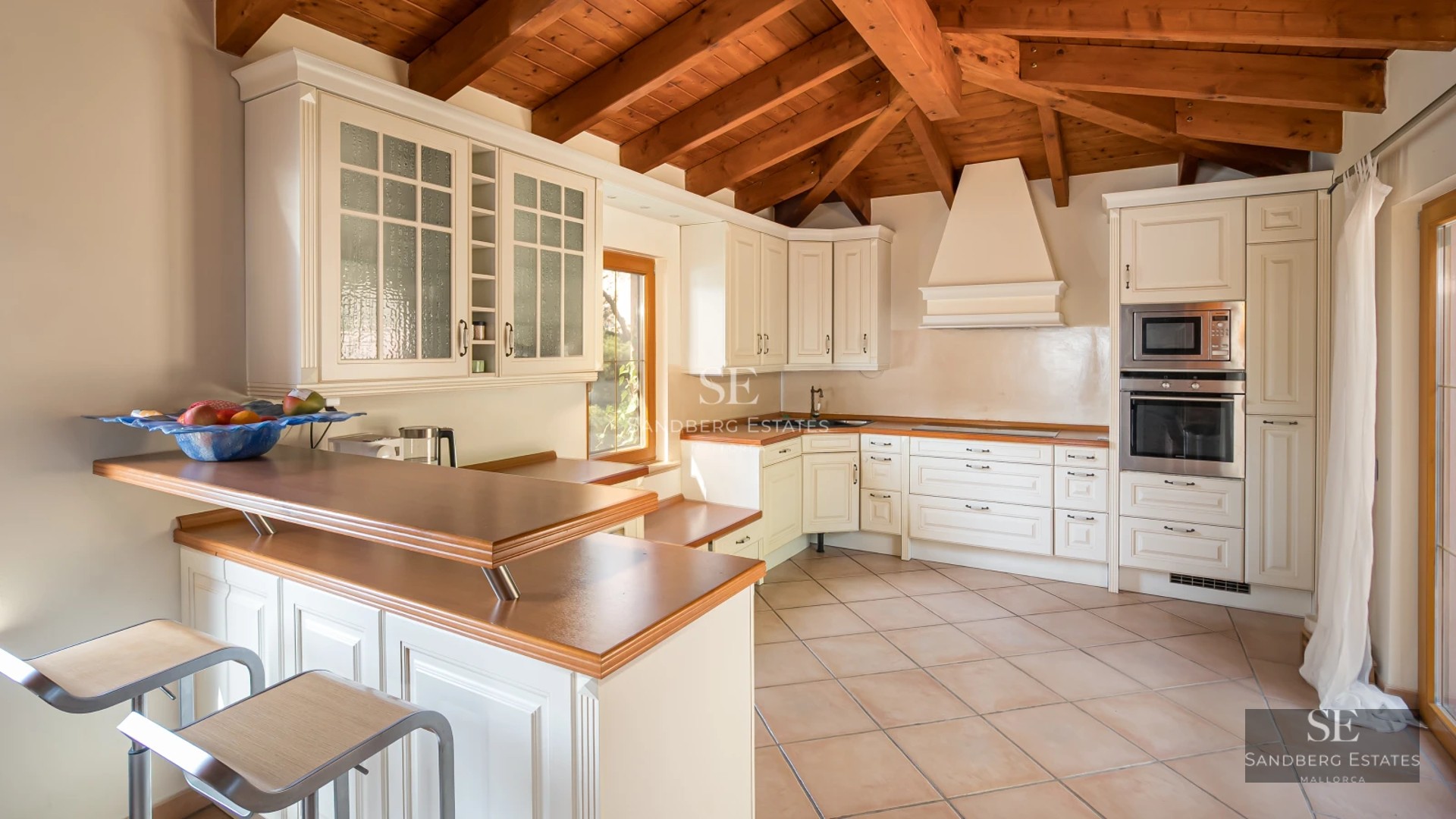 Spacious terrace with a view. Modern furniture, private pool, wooden floors. Perfect for enjoying the outdoors.