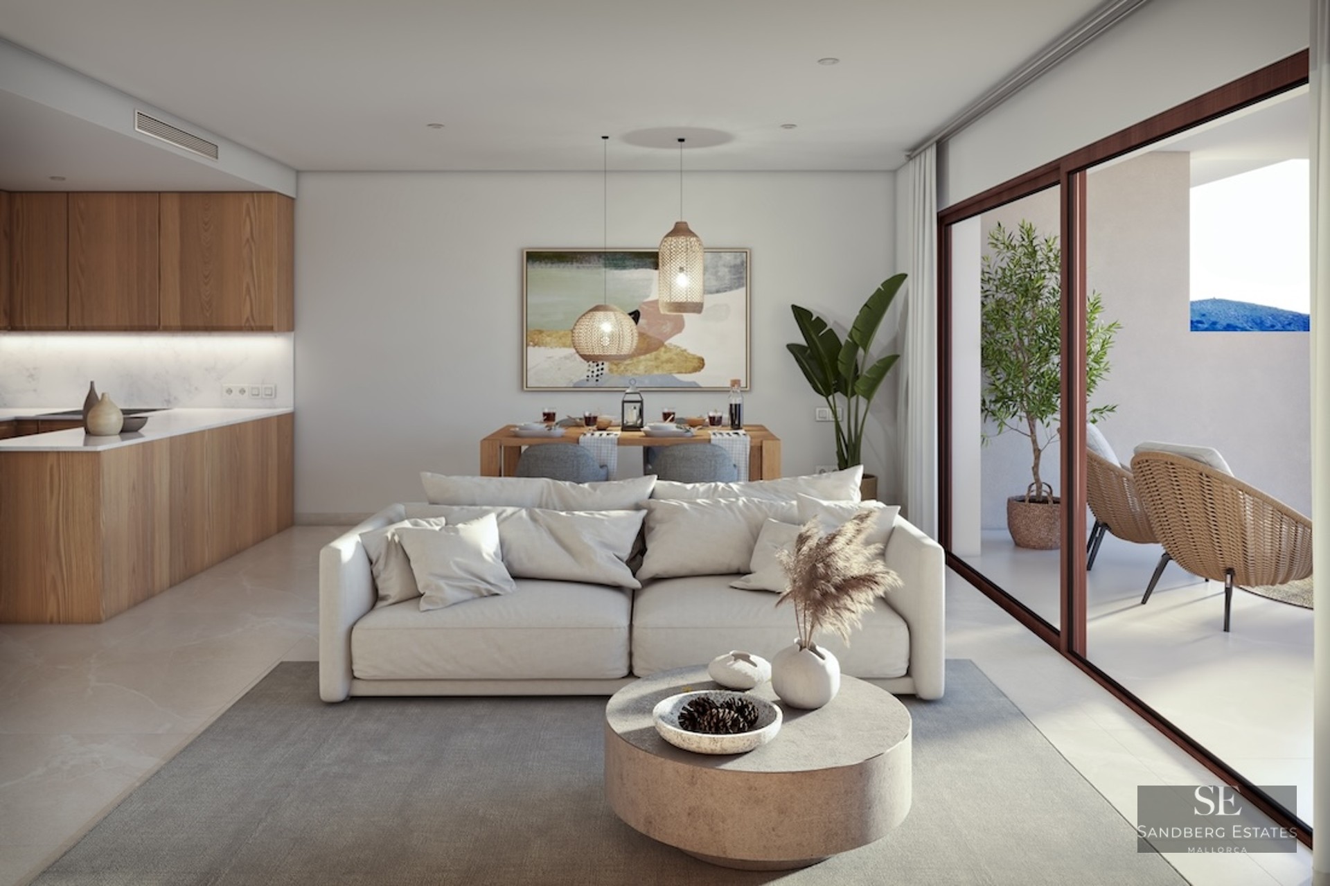Bright open-plan living room with white sofa, wooden kitchen, and large sliding doors leading to a terrace.