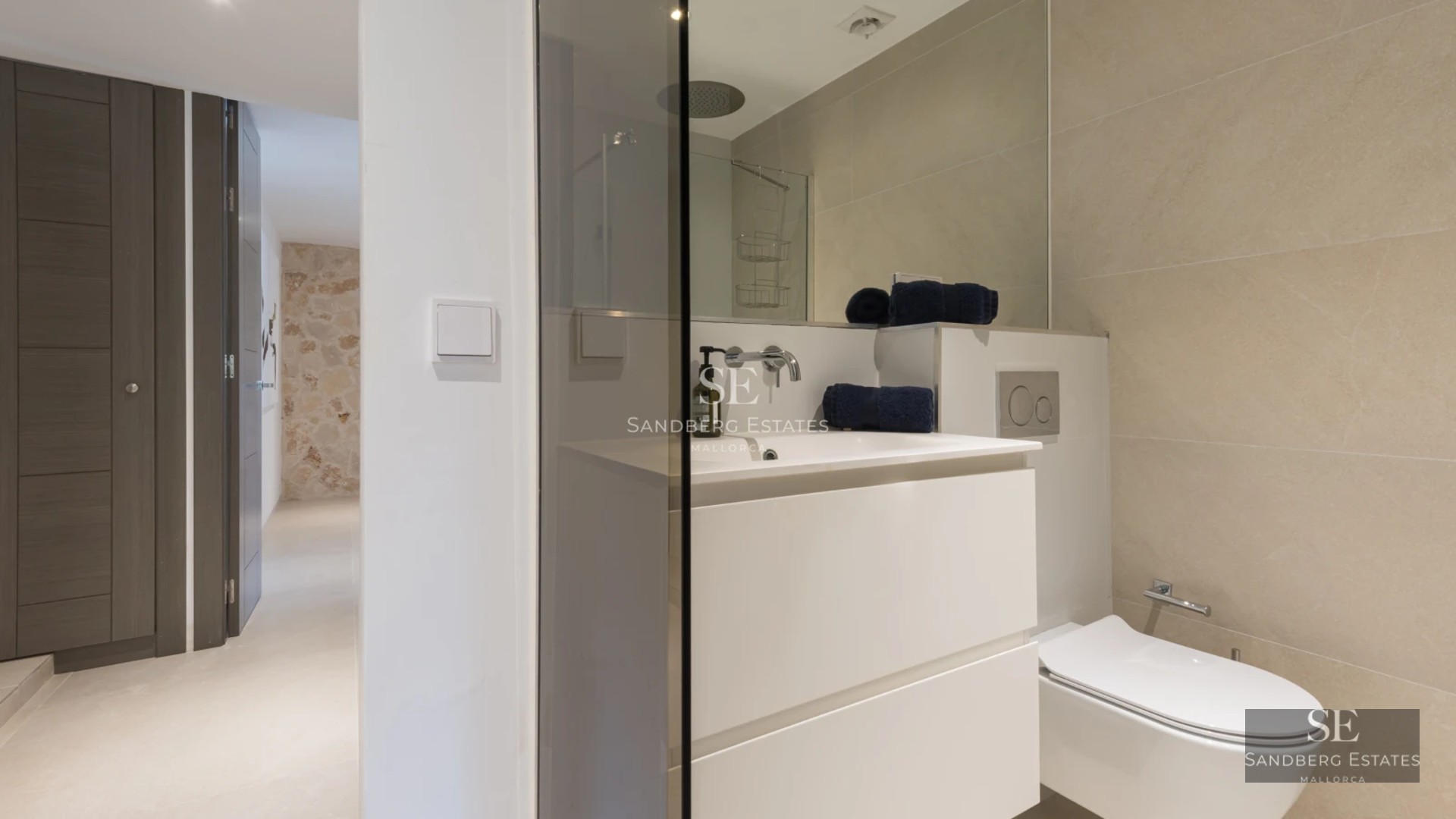 Exterior view of a modern villa featuring a swimming pool, garden, and minimalist architecture. Large windows and natural light.