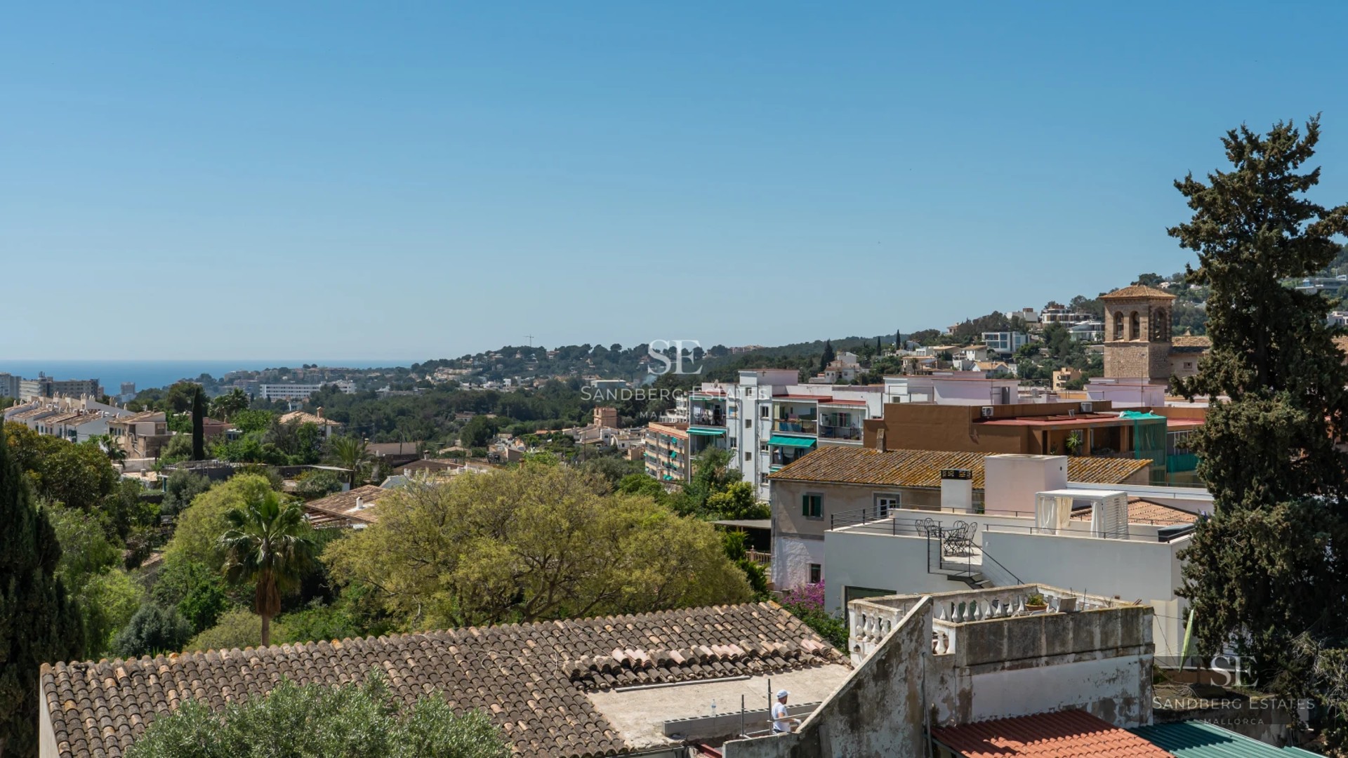 Image of villa with infinity pool, modern sun loungers, and panoramic sea views. Minimalist architecture with large windows.