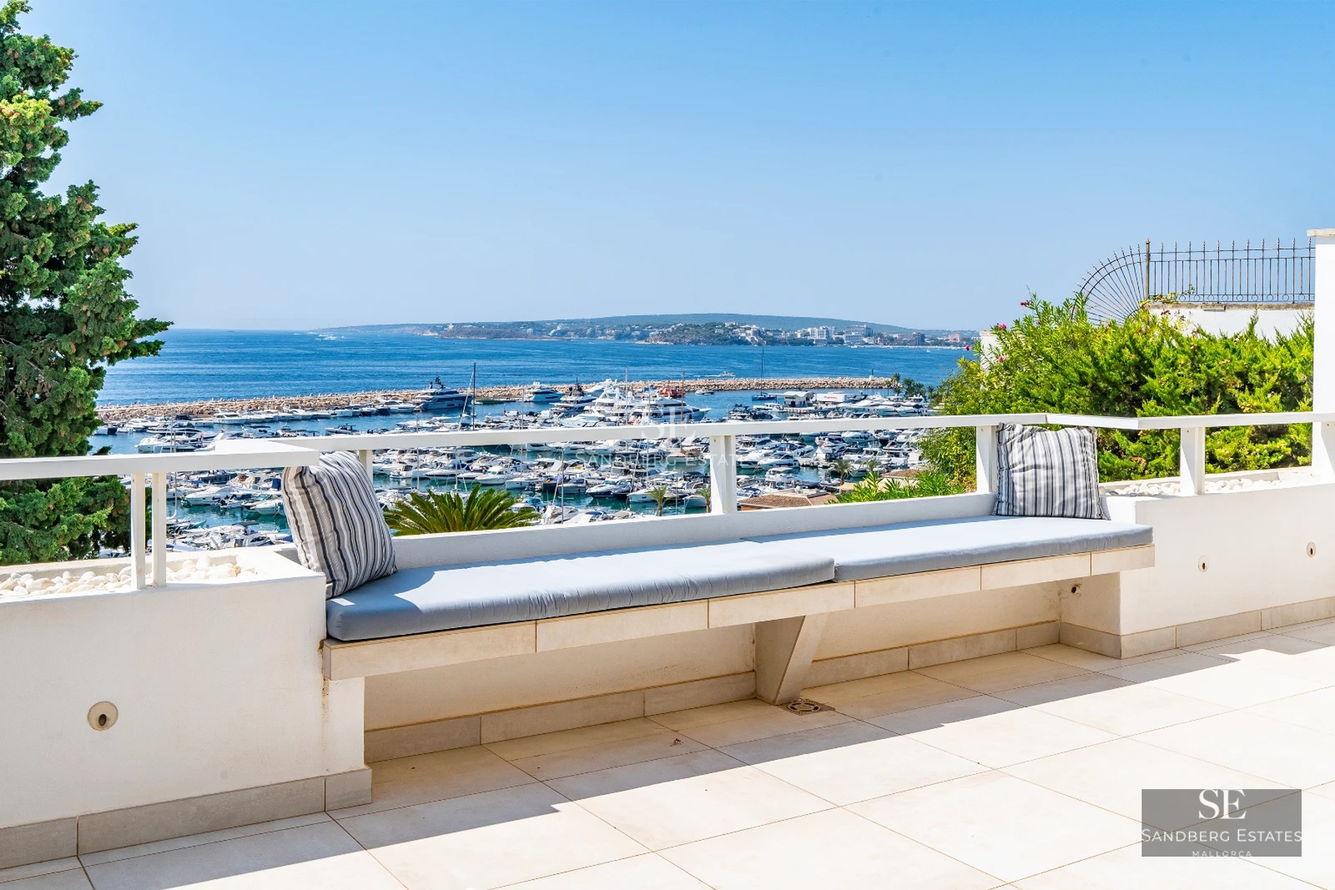 Exterior of modern villa with reflective pool, lush garden, and large windows. Minimalist architectural design.