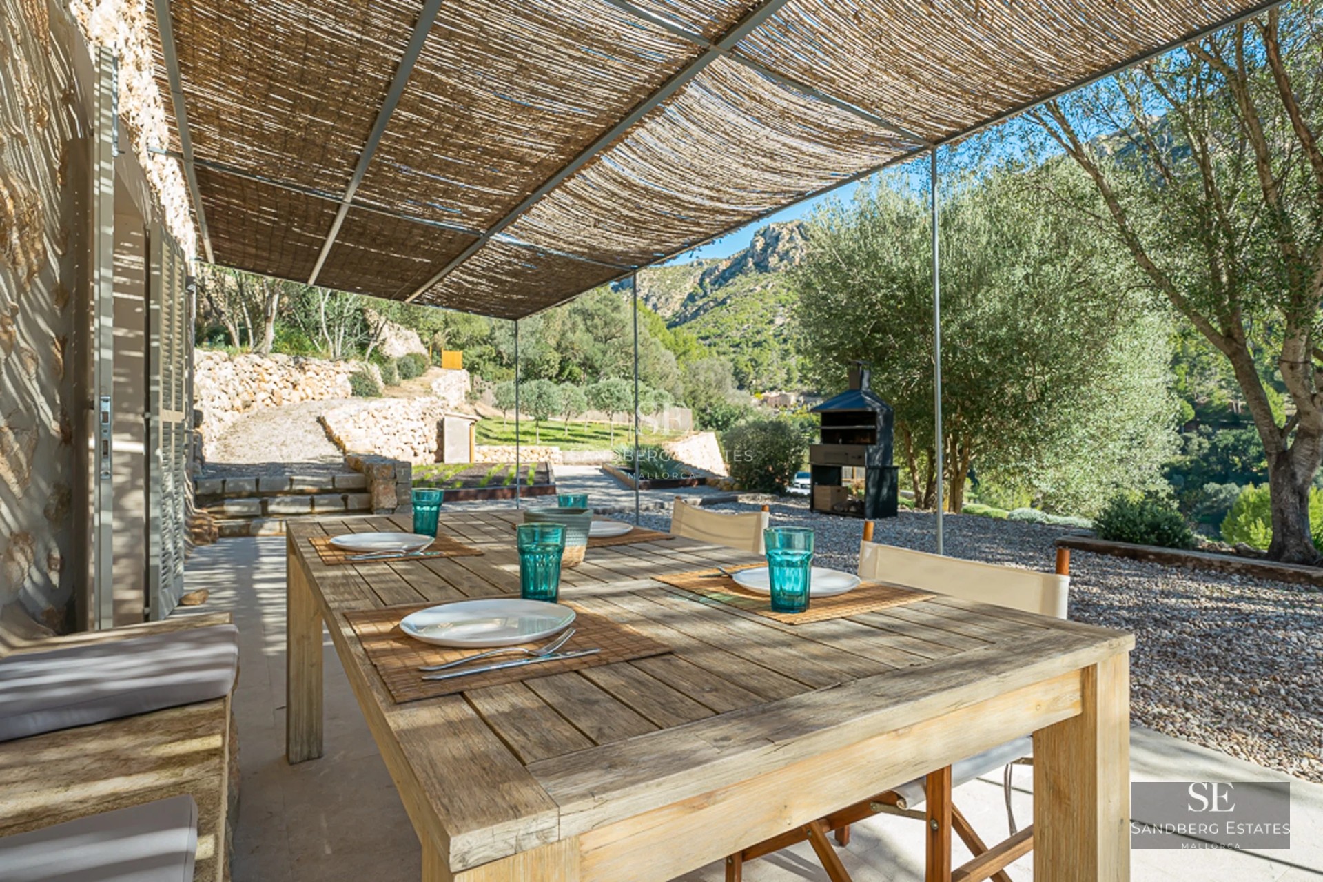 Modern exterior with reflective pool. Clean architecture, ambient lighting, and landscaped grounds. Ideal for relaxation and entertaining.