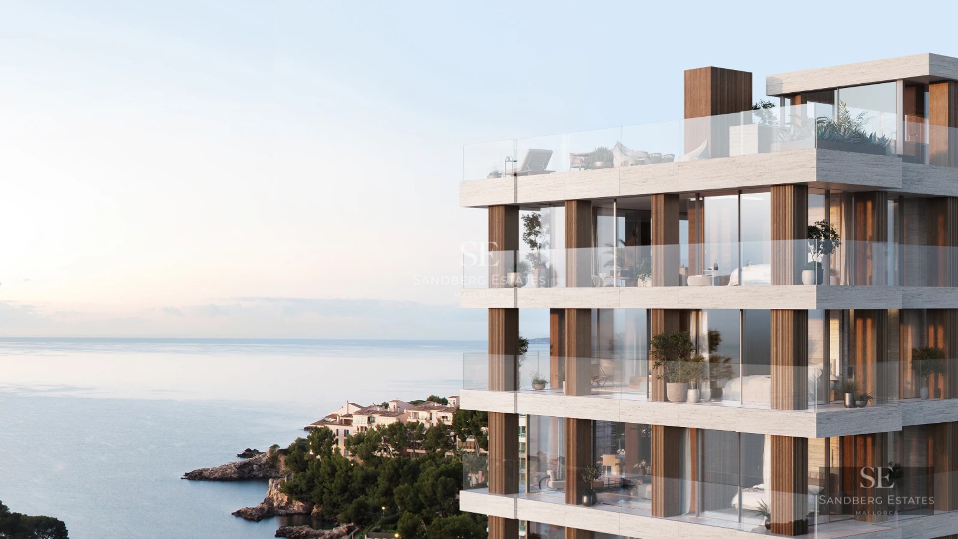 Expansive terrace with infinity pool, sun loungers, and ocean views. Modern design, elegant and bright. Ideal for relaxation.