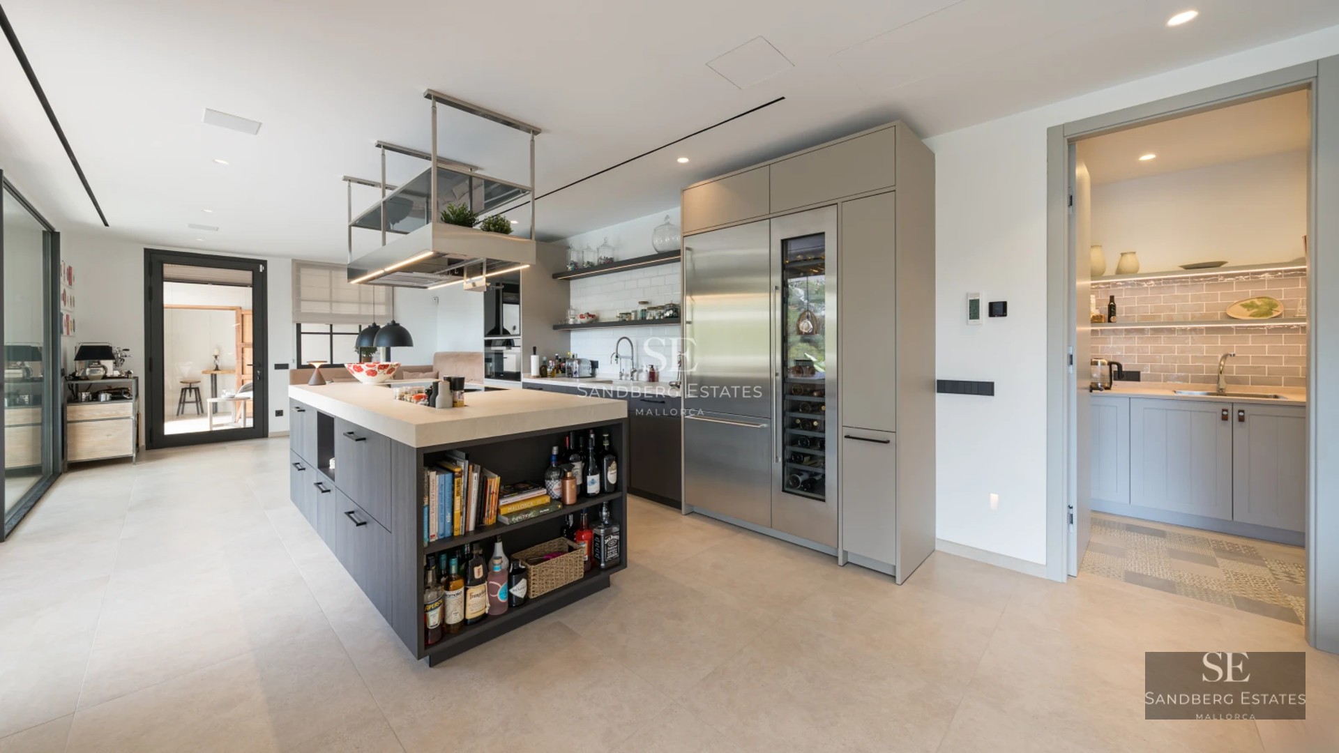 Image of a luxurious property with an infinity pool and panoramic views. Modern design with spacious terraces and lush gardens.