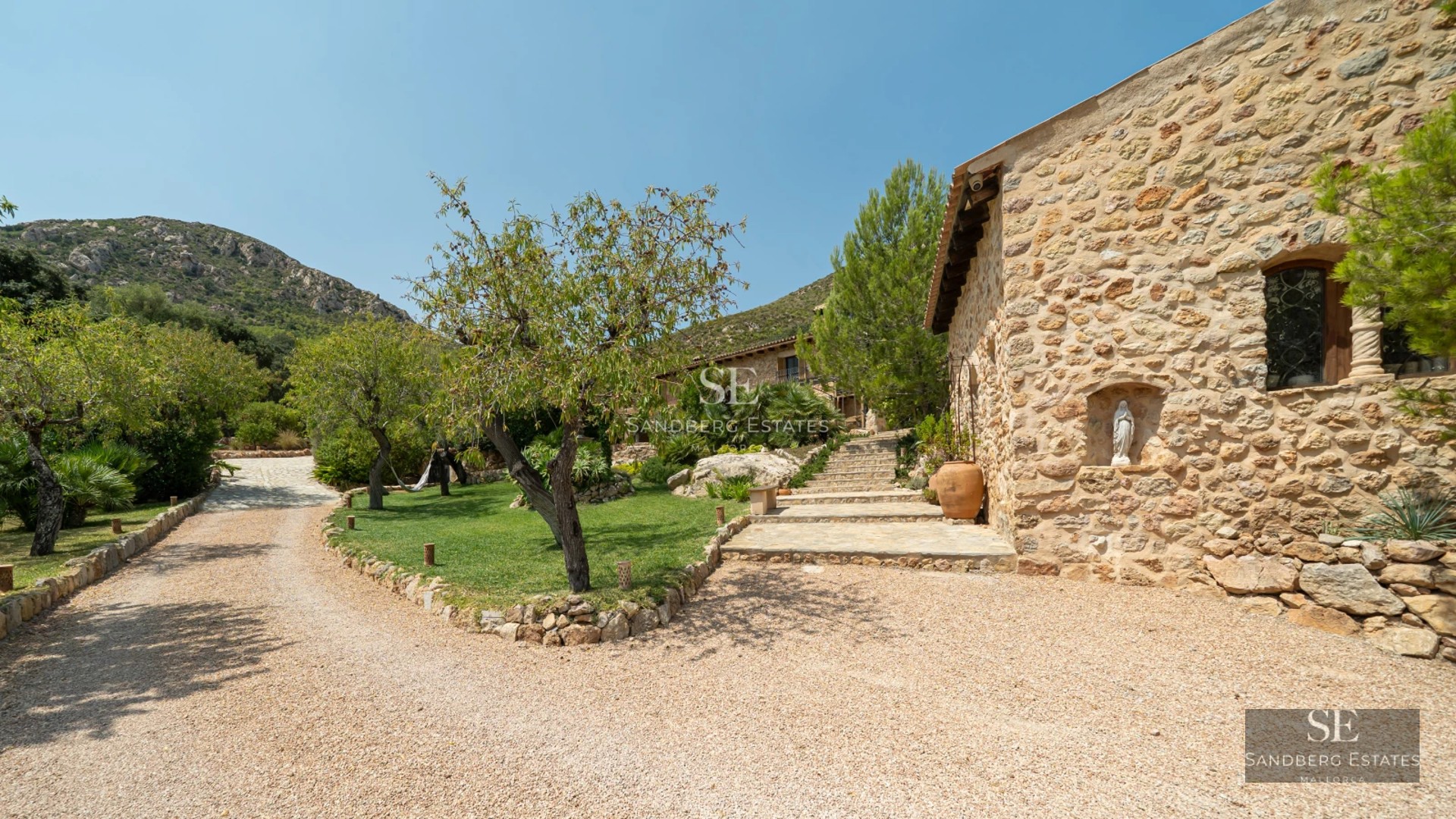 Infinity pool view, modern outdoor furniture, lush greenery. Contemporary architecture and harmonious landscape design.