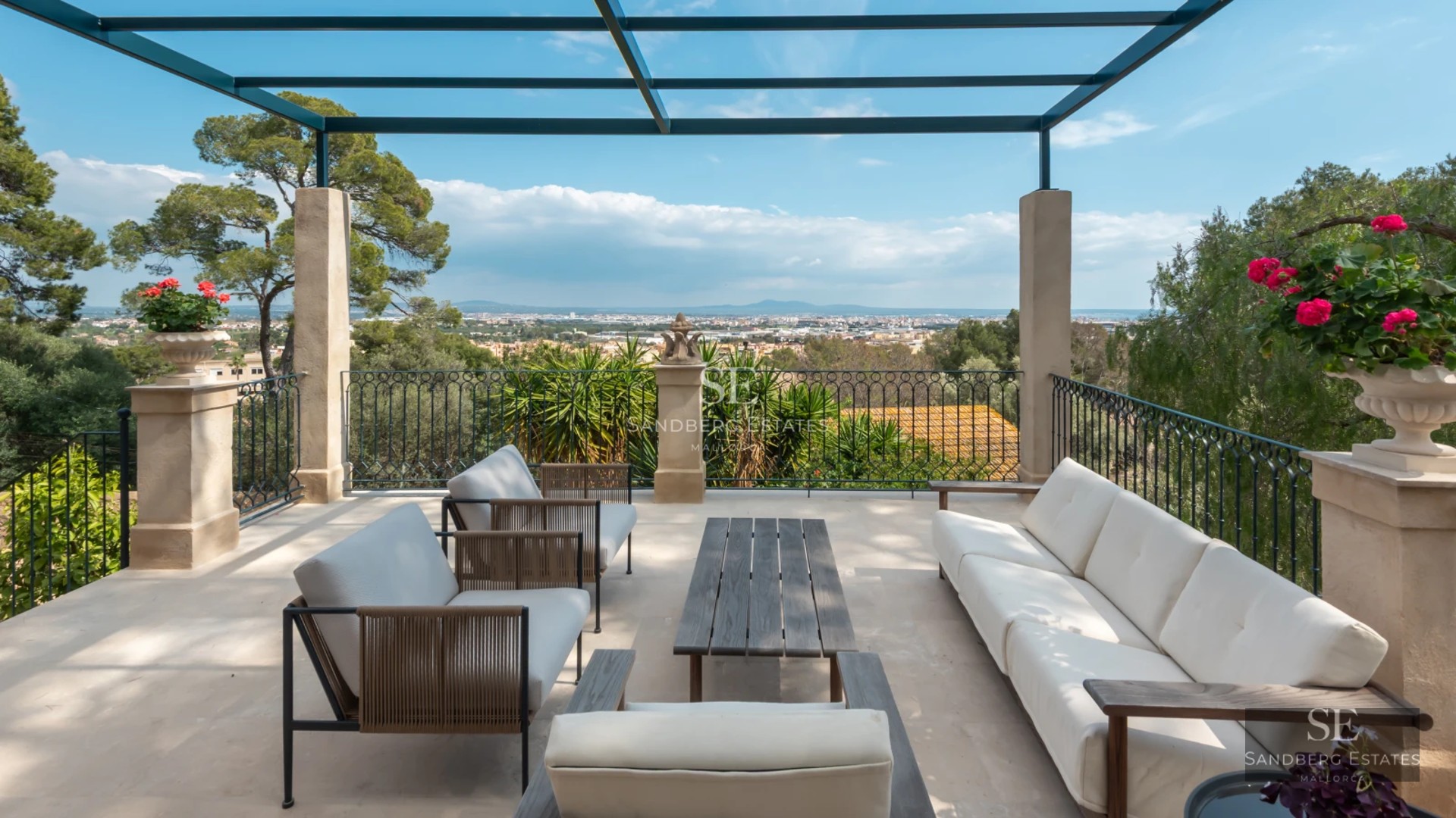 View of an infinity pool surrounded by lush greenery and modern architecture. Minimalist and elegant design with soft lighting.