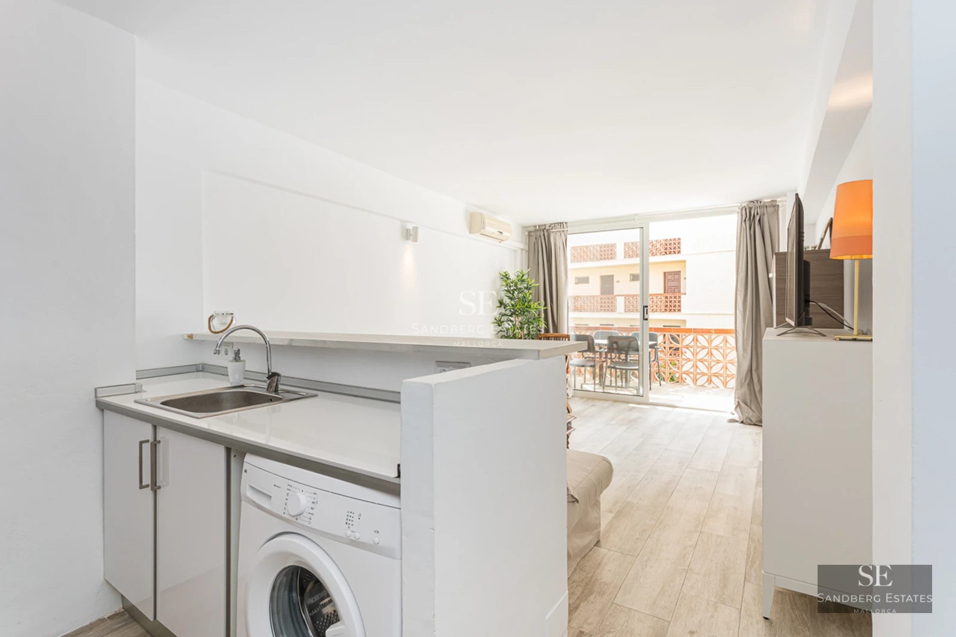 Exterior of a modern villa featuring a pool, large windows, minimalist landscaping, and an elegant terrace. Soft ambient lighting.