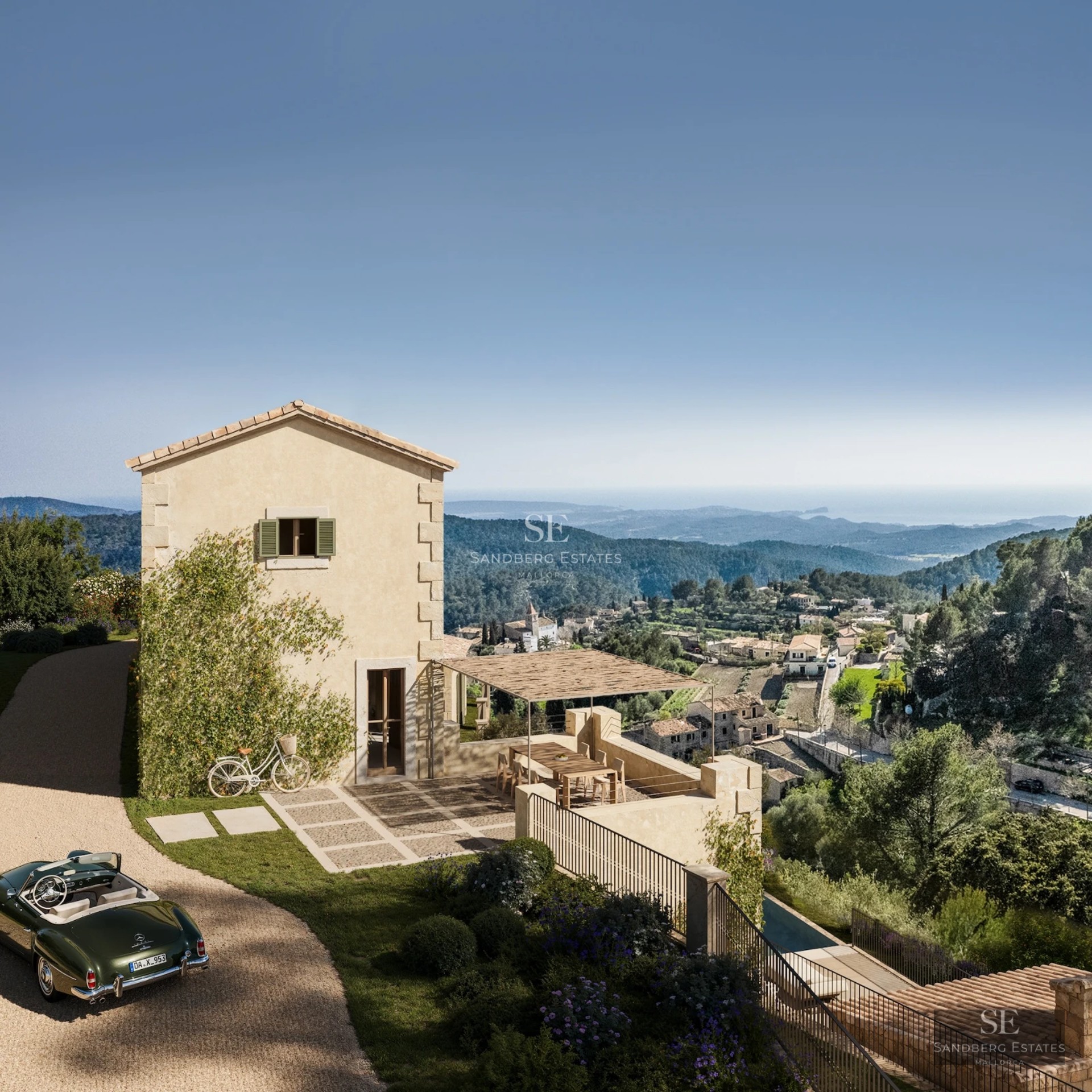 Spacious living room with large windows, light wood flooring and modern furnishings. Panoramic views of the outdoors.