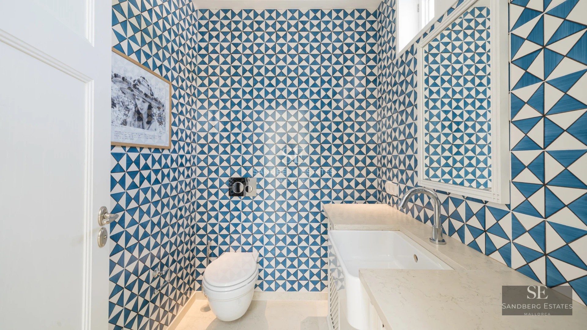 Spacious terrace featuring an infinity pool and panoramic sea views. Modern design with elegant furniture and landscaping details.