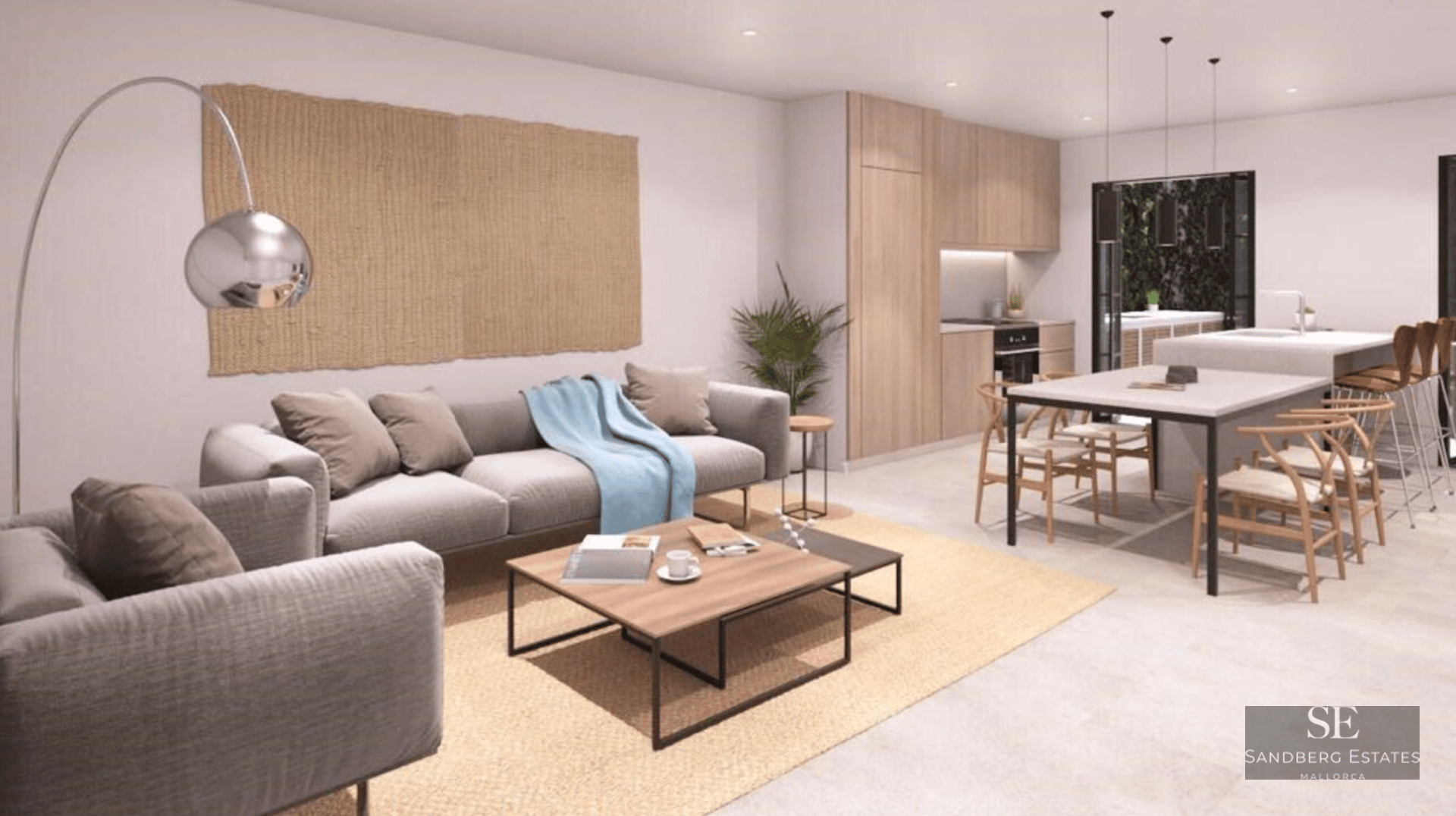 Contemporary living room featuring a grey sofa, wooden dining table, and integrated light wood kitchen.