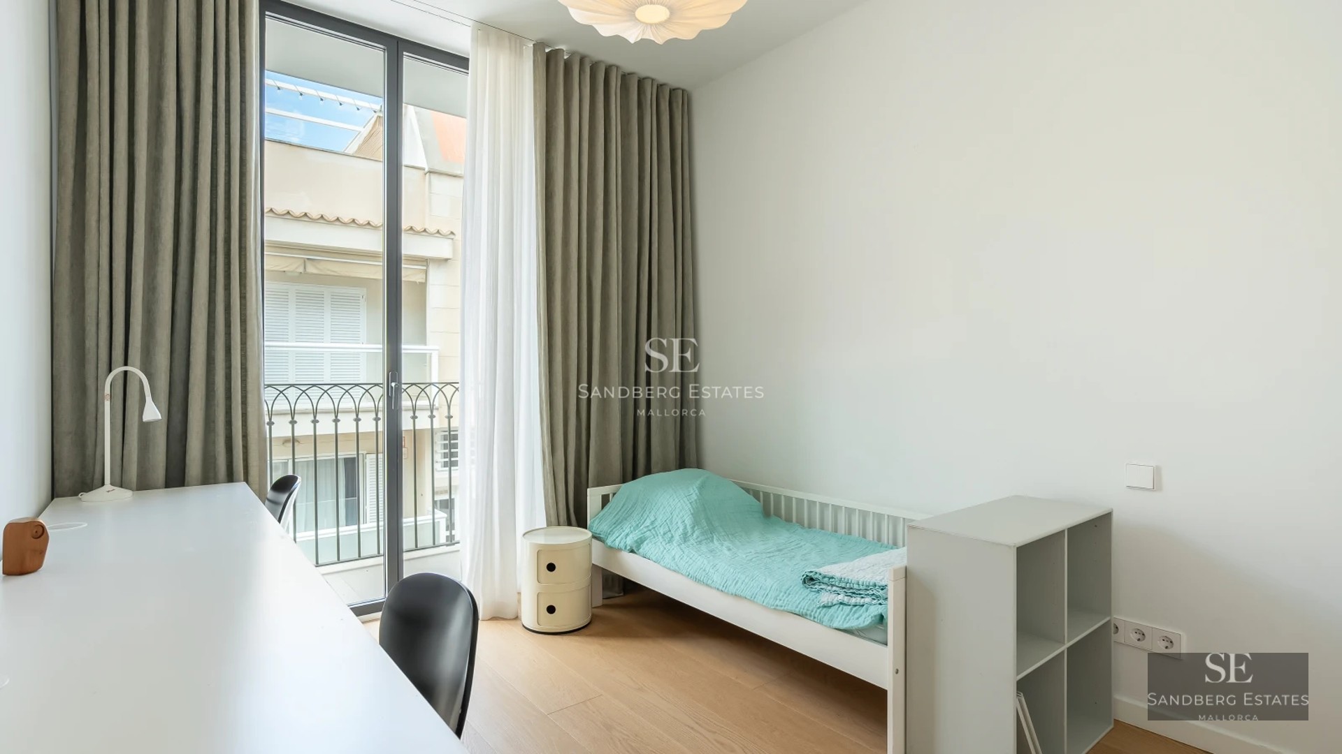 Spacious terrace with infinity pool and panoramic views. Modern design with elegant furniture and lush gardens.