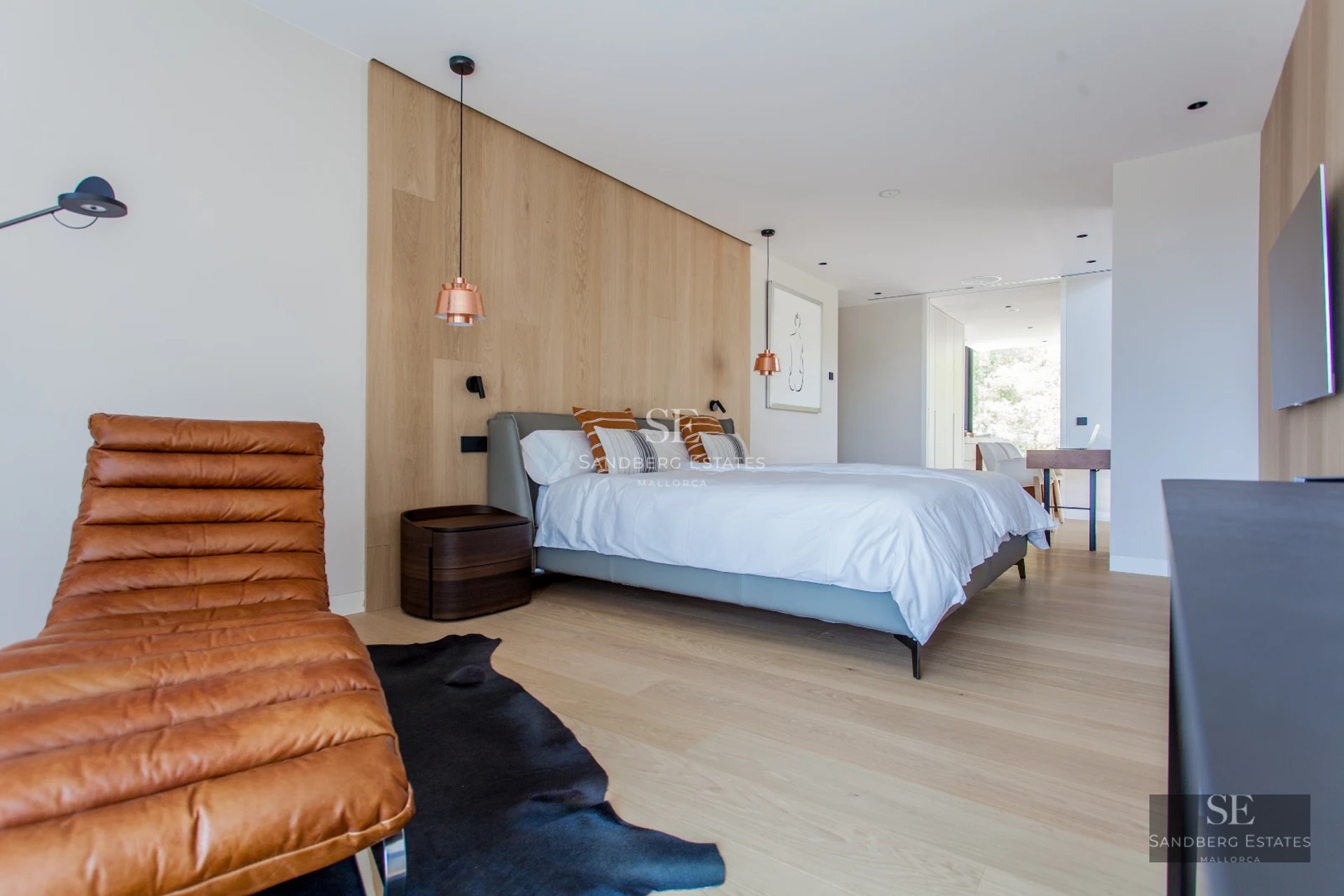 Spacious terrace with pool and sea view. Modern design with glass railing and elegant furniture. Ambient lighting.