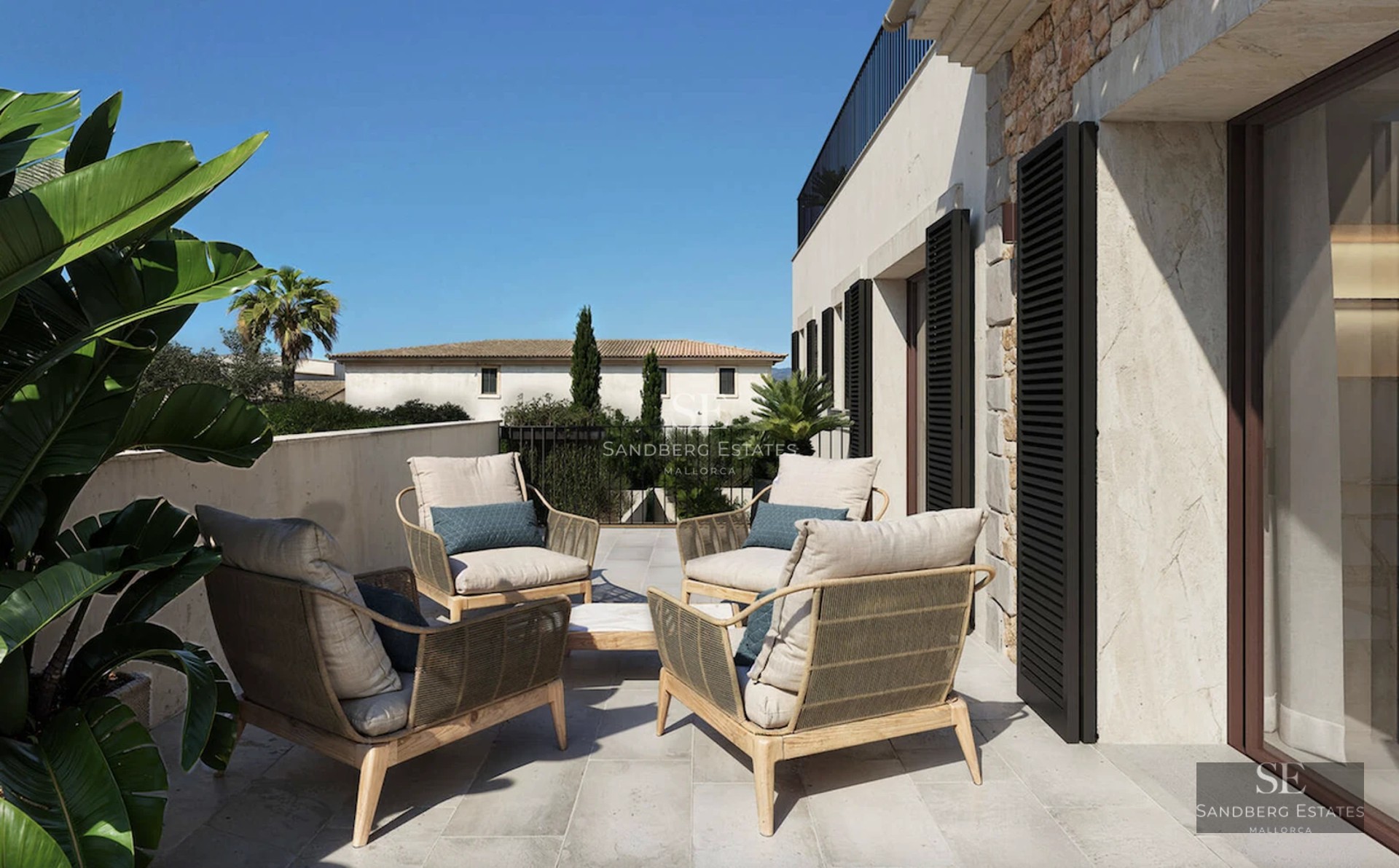Aerial view of a modern villa with turquoise pool, surrounded by lush gardens and minimalist architecture. Natural lighting.