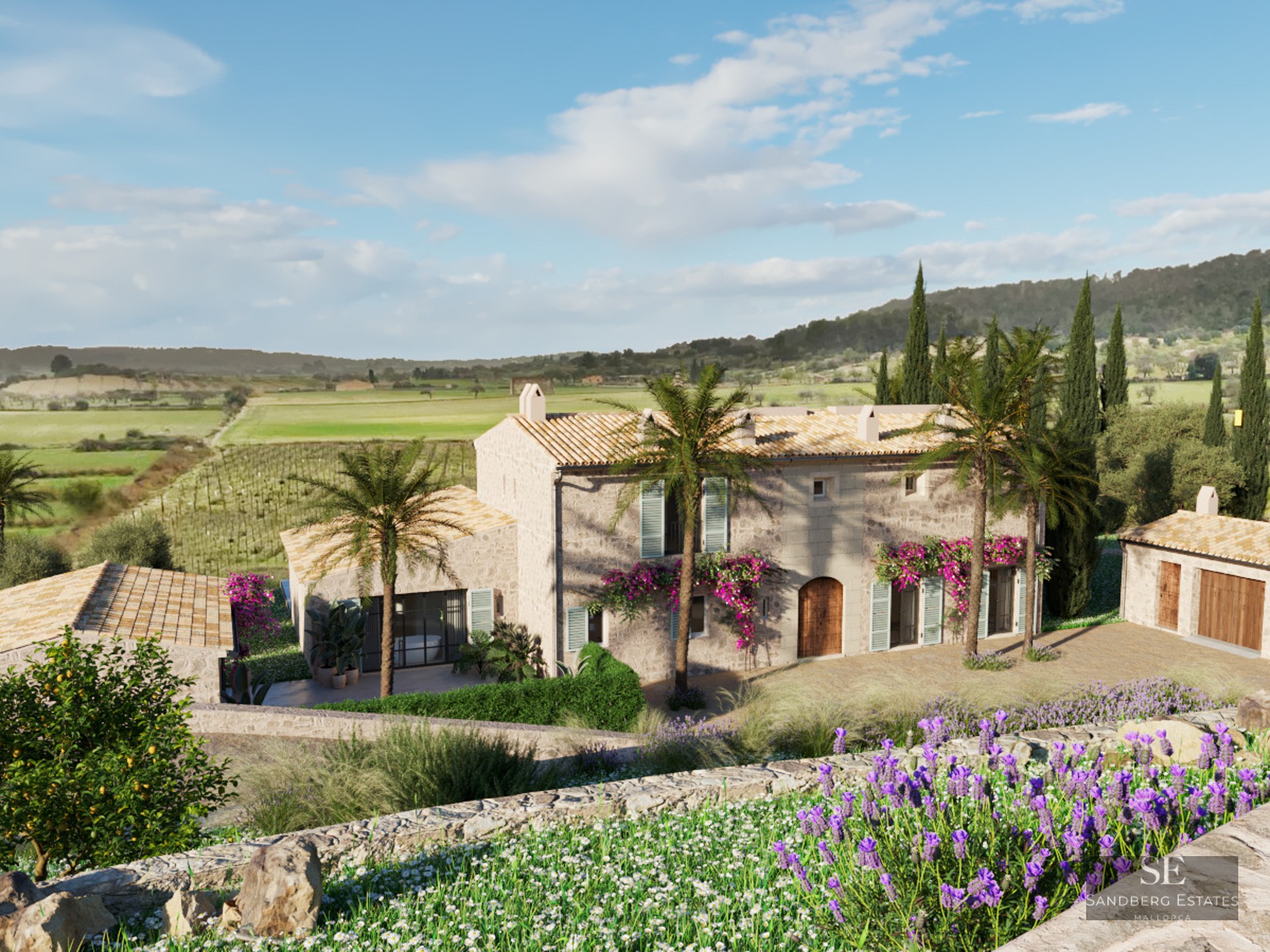 Large rustic stone villa with terracotta roofs, palm trees, and lavender fields under a bright blue sky.