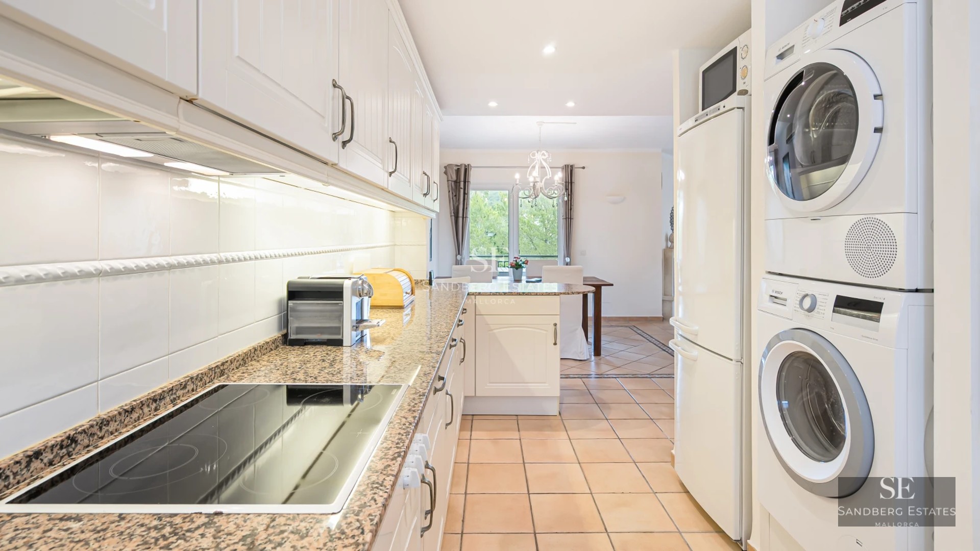 Exterior view of a modern villa with an infinity pool, lush gardens, and minimalist architecture. Bright panoramic windows.
