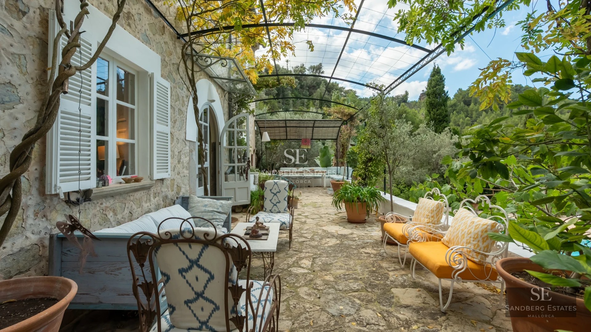 Exterior view of a modern villa with a pool. Minimalist design, large terraces, and lush garden. Ideal for investment.