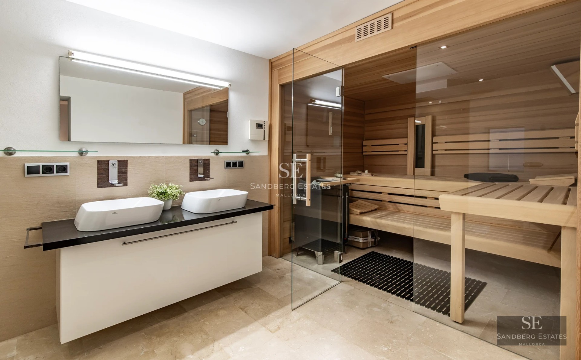 Large reflecting pool with modern architecture. Stylish outdoor furniture. Warm ambient lighting. Lush vegetation.