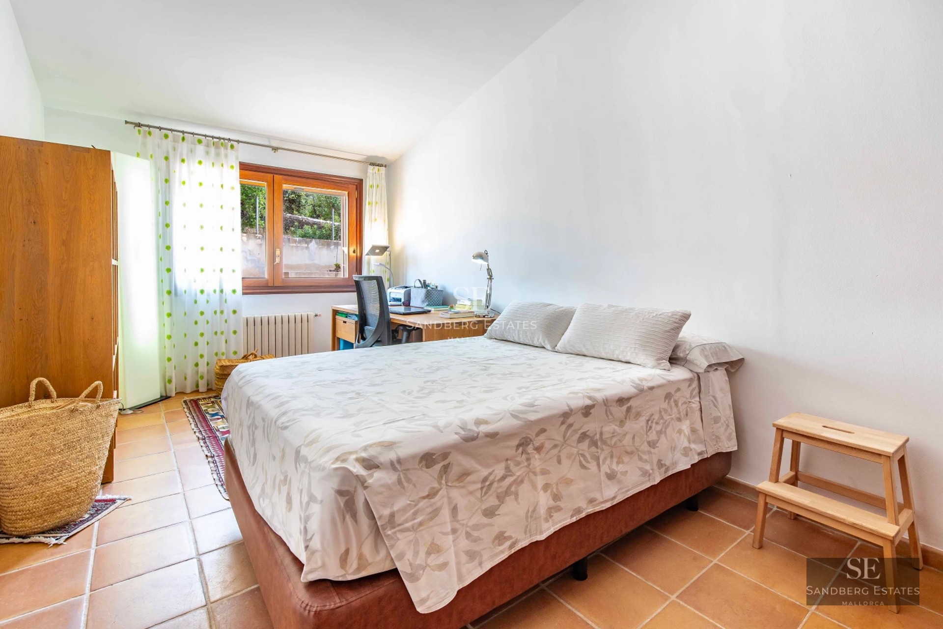 Spacious balcony with sea views. Modern design featuring glass railing and elegant furniture. Bright and welcoming outdoor space.