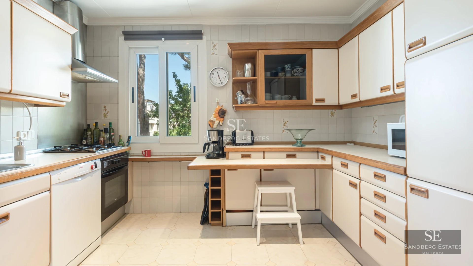 Exterior of modern villa with infinity pool, sun loungers, and panoramic sea view. Minimalist design with large windows.