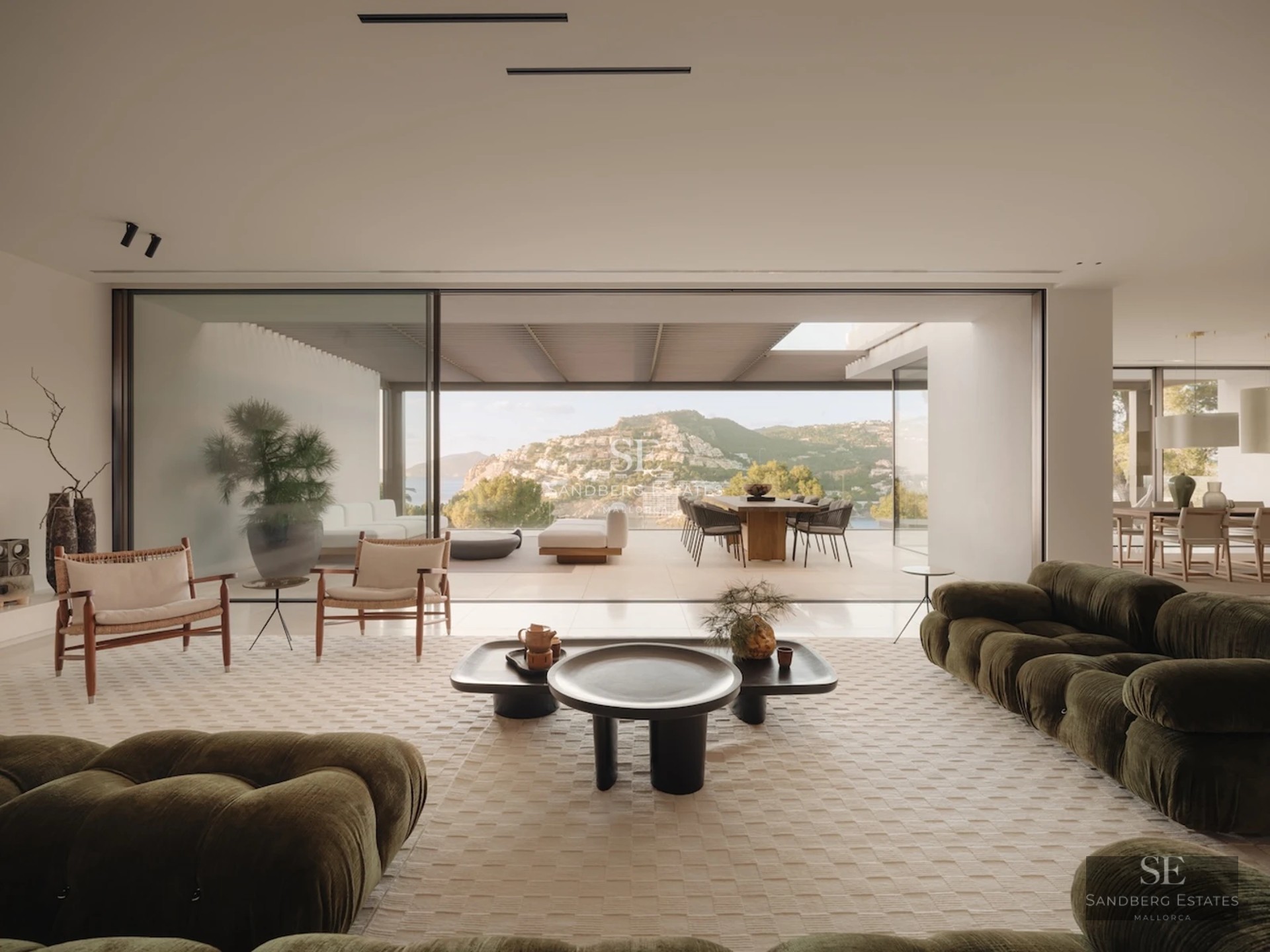 Exterior view of a modern villa with swimming pool and garden. Minimalist design, soft lighting, and high-quality finishes.