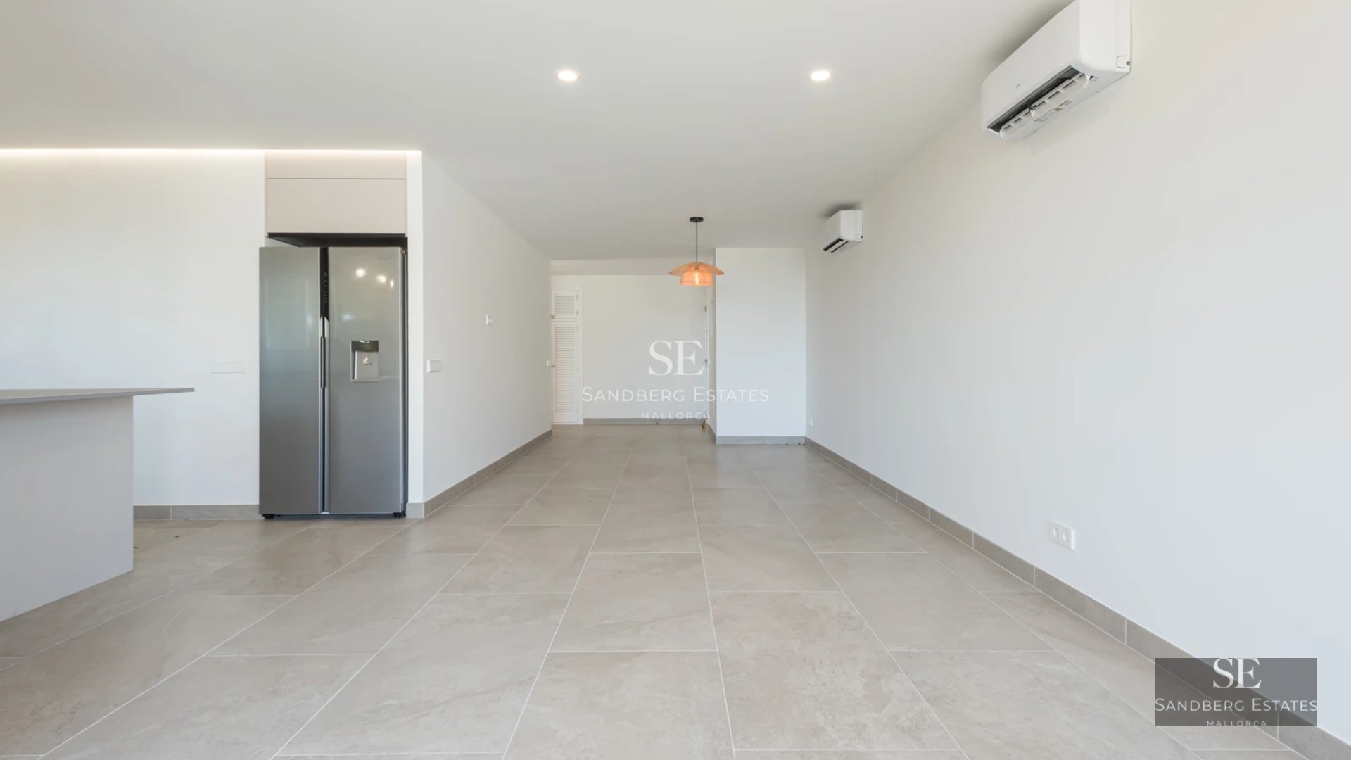 Aerial view of infinity pool, expansive terraces, modern design. Natural lighting, lush landscaping. Ideal for luxury living.