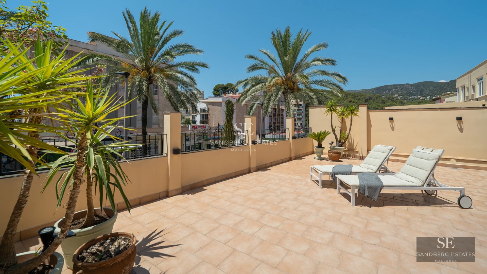 Exterior view of a modern villa with infinity pool. Minimalist architecture, large windows, lush garden, and blue sky.