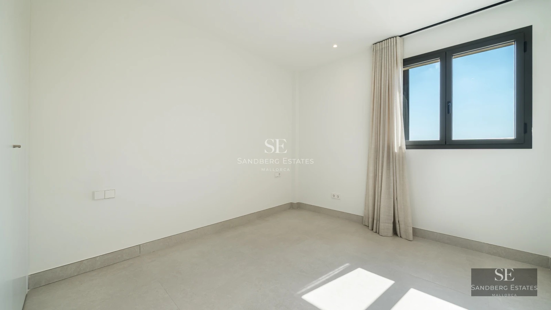 Image of an elegant property with a pool, garden, and modern architecture. Natural lighting enhances the beauty of the exterior design.