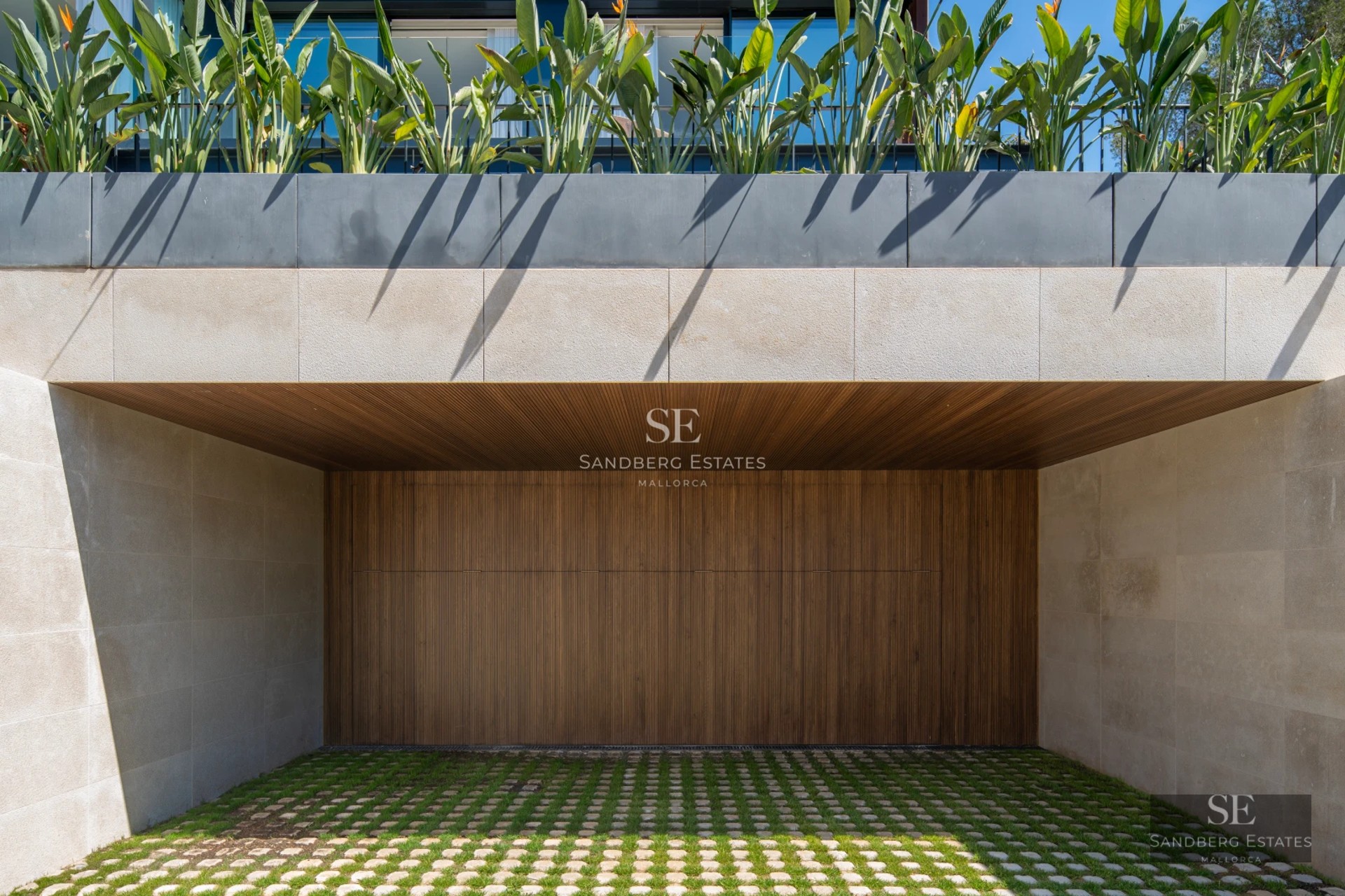 Spacious living room featuring a modern fireplace, natural light and large windows. Contemporary and elegant design.