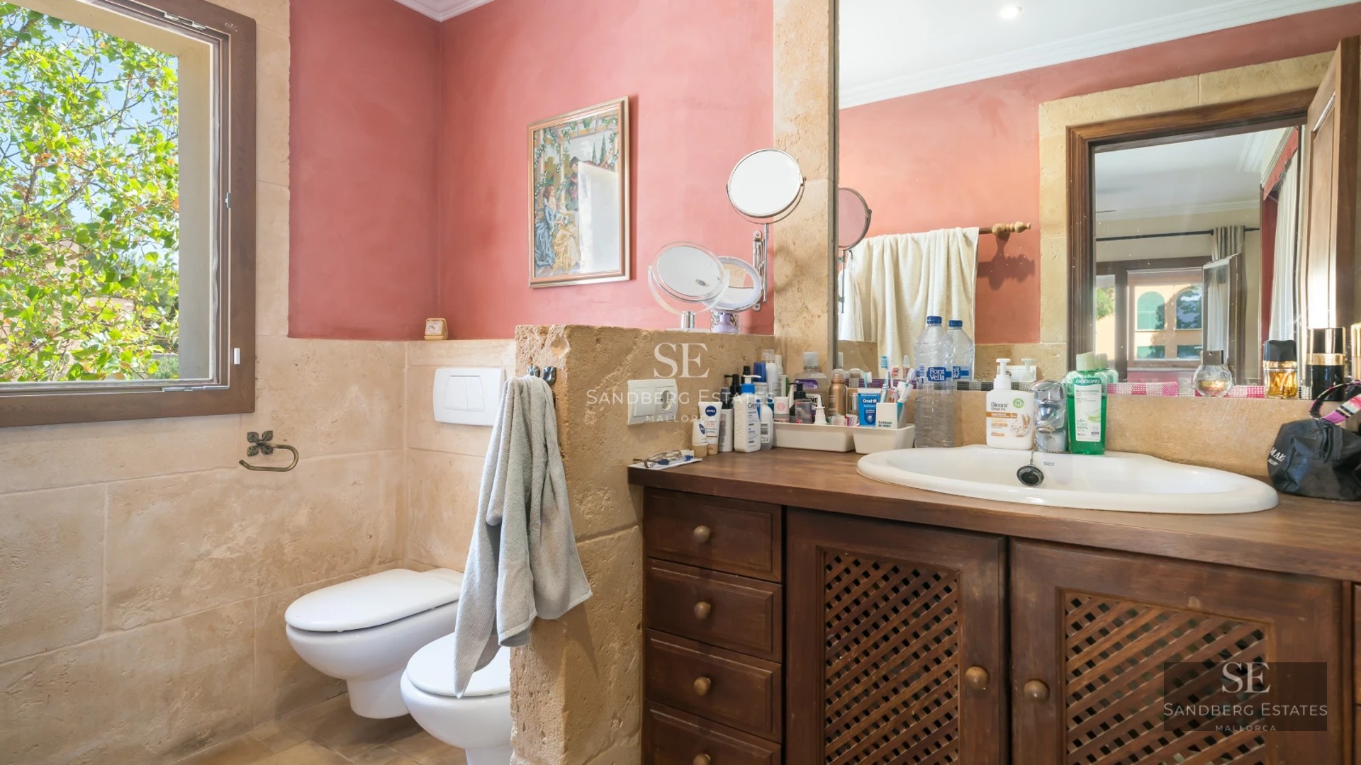 Exterior of a modern villa with a pool, minimalist design, large windows, and manicured landscaping.