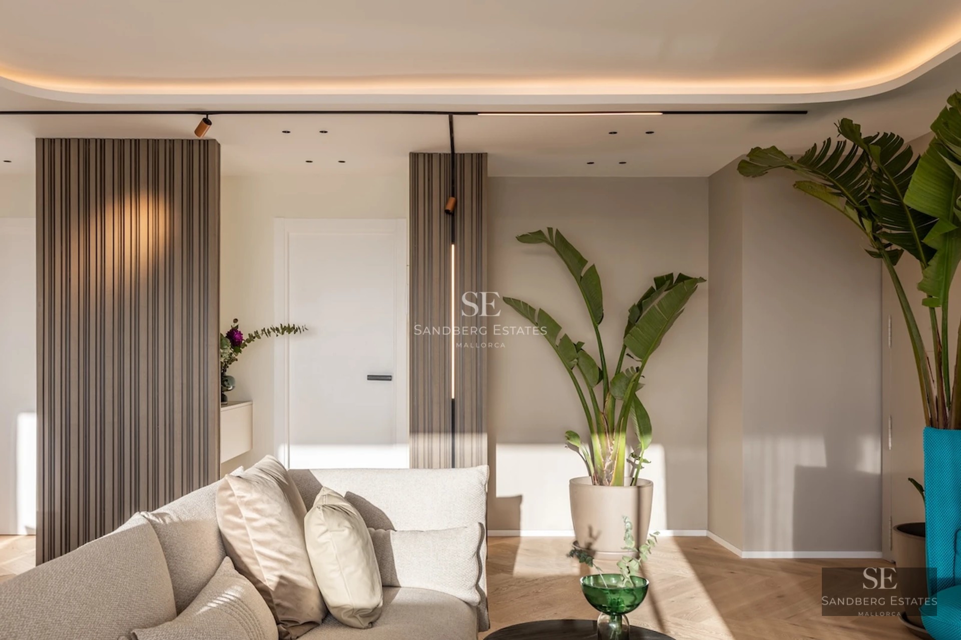 Exterior view of a modern house with a pool, lush garden, and large windows. Minimalist architecture and elegant landscaping.