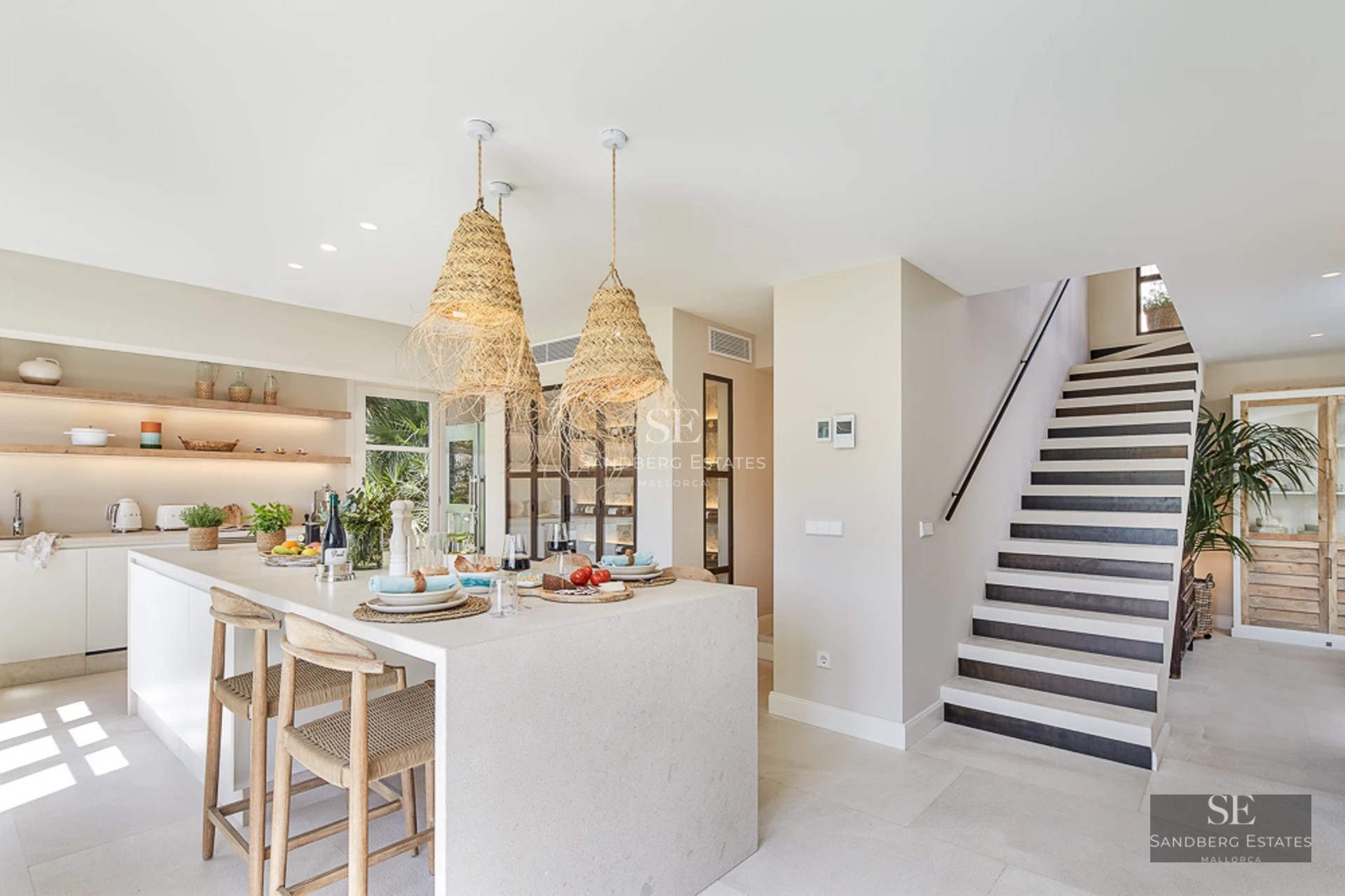 Image of a modern villa with an infinity pool, large windows, and minimalist design. Well-maintained garden and sea views.