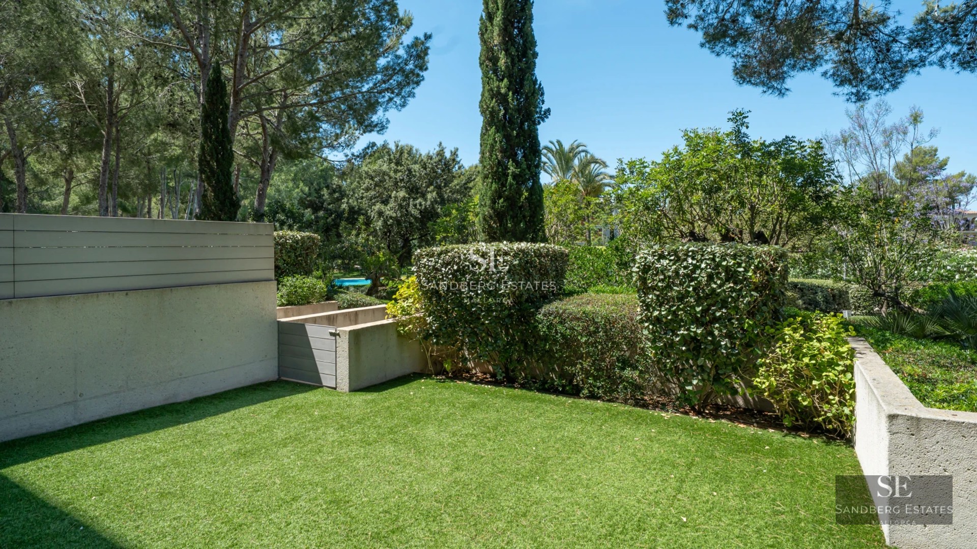 Spacious terrace with pool and lounge area. Modern architecture with large windows and panoramic views. High-quality outdoor furniture.