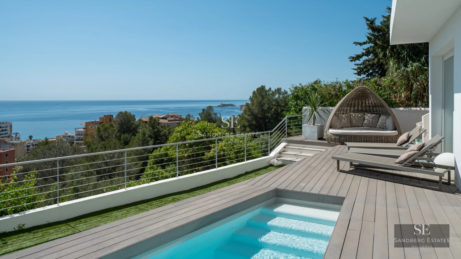 Modern exterior with reflective pool, manicured garden, and expansive glass windows. Minimalist and elegant design. Soft ambient lighting.