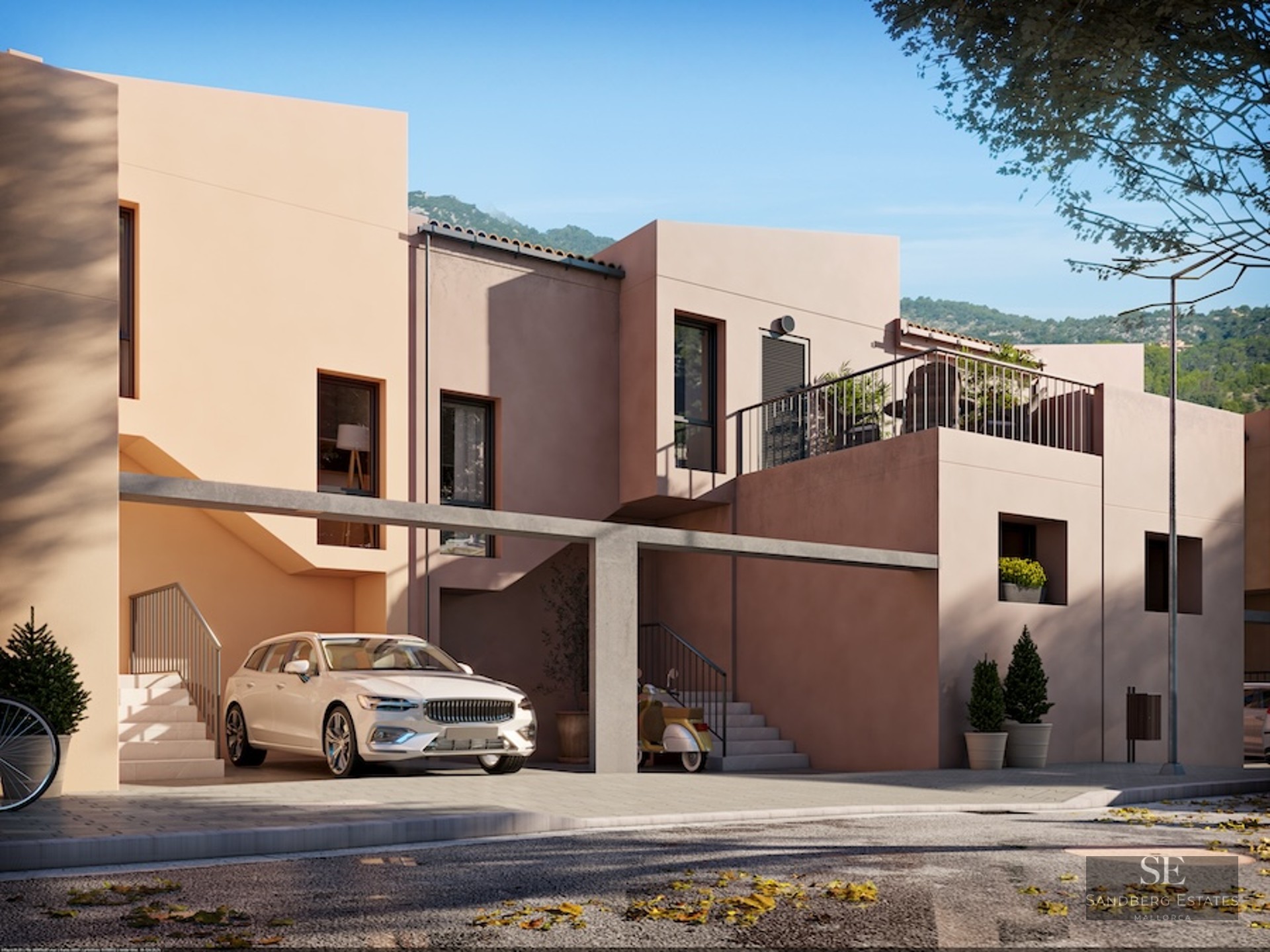 Modern multi-level home with peach-colored walls, a covered parking area with a white car, and architectural stairs.
