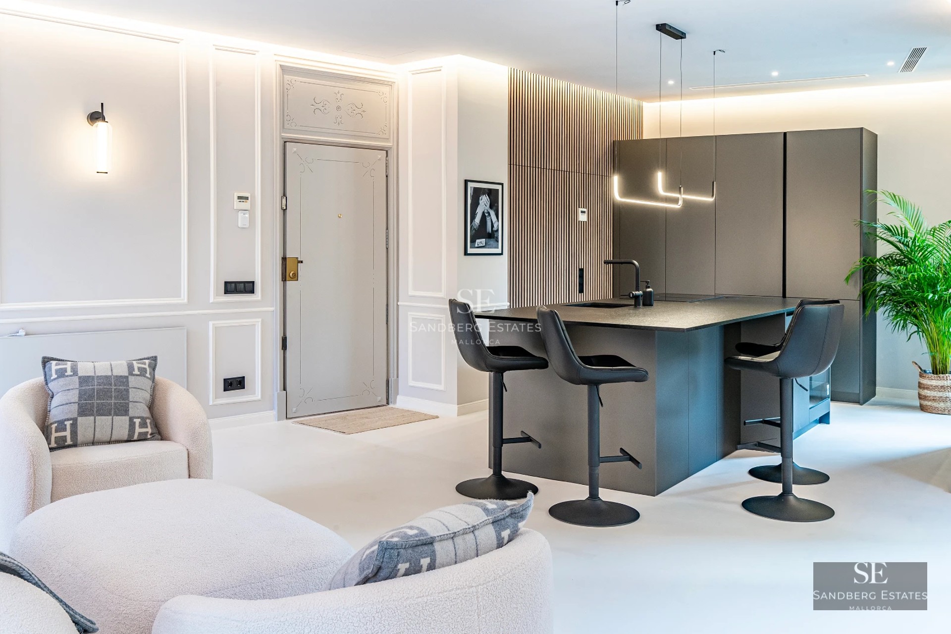 Terrace with panoramic sea views. Modern design, glass railing and stylish outdoor furniture. Bright and spacious area.