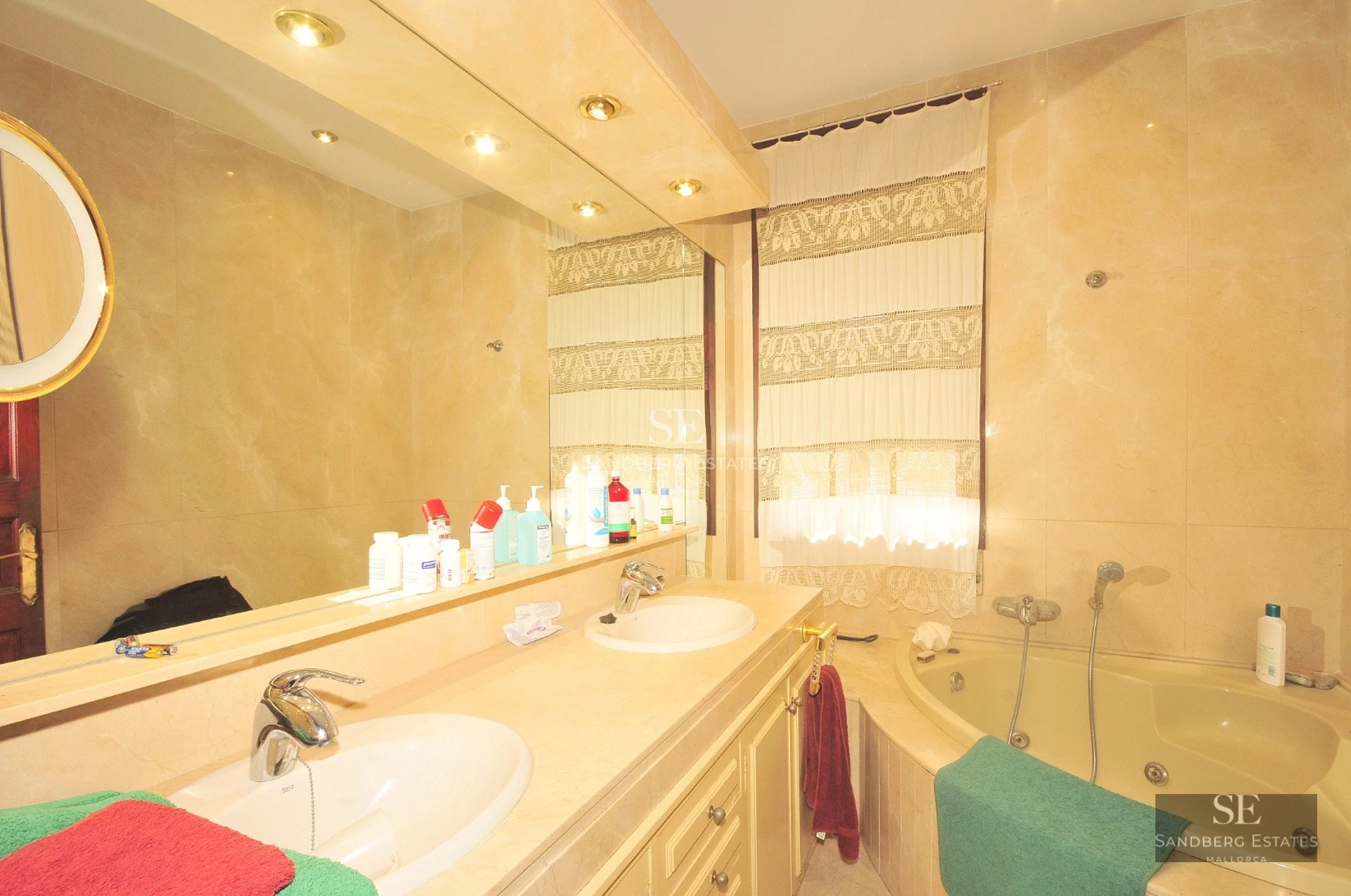 View of modern villa with pool, surrounded by greenery. Minimalist architecture and elegant design. Warm lighting at sunset.