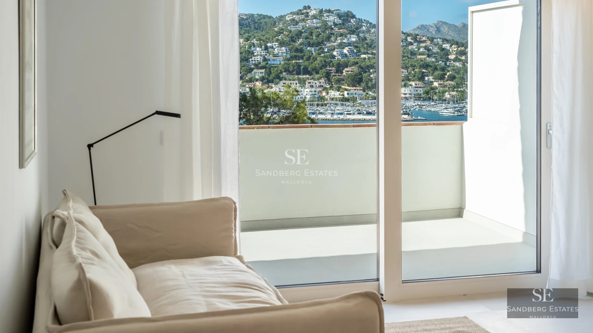 Exterior view of a modern villa with a pool, palm trees, and large glass windows. Minimalist architecture. Warm lighting.