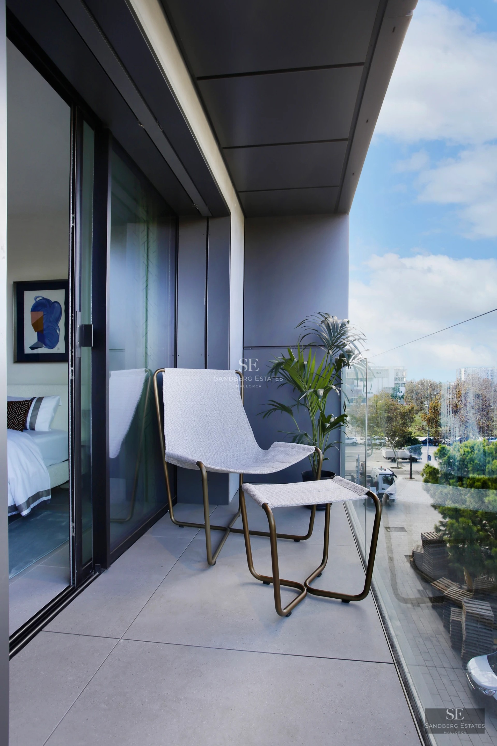 Pool view of modern villa featuring expansive windows, lush landscaping, and minimalist architectural design. Ambient lighting.