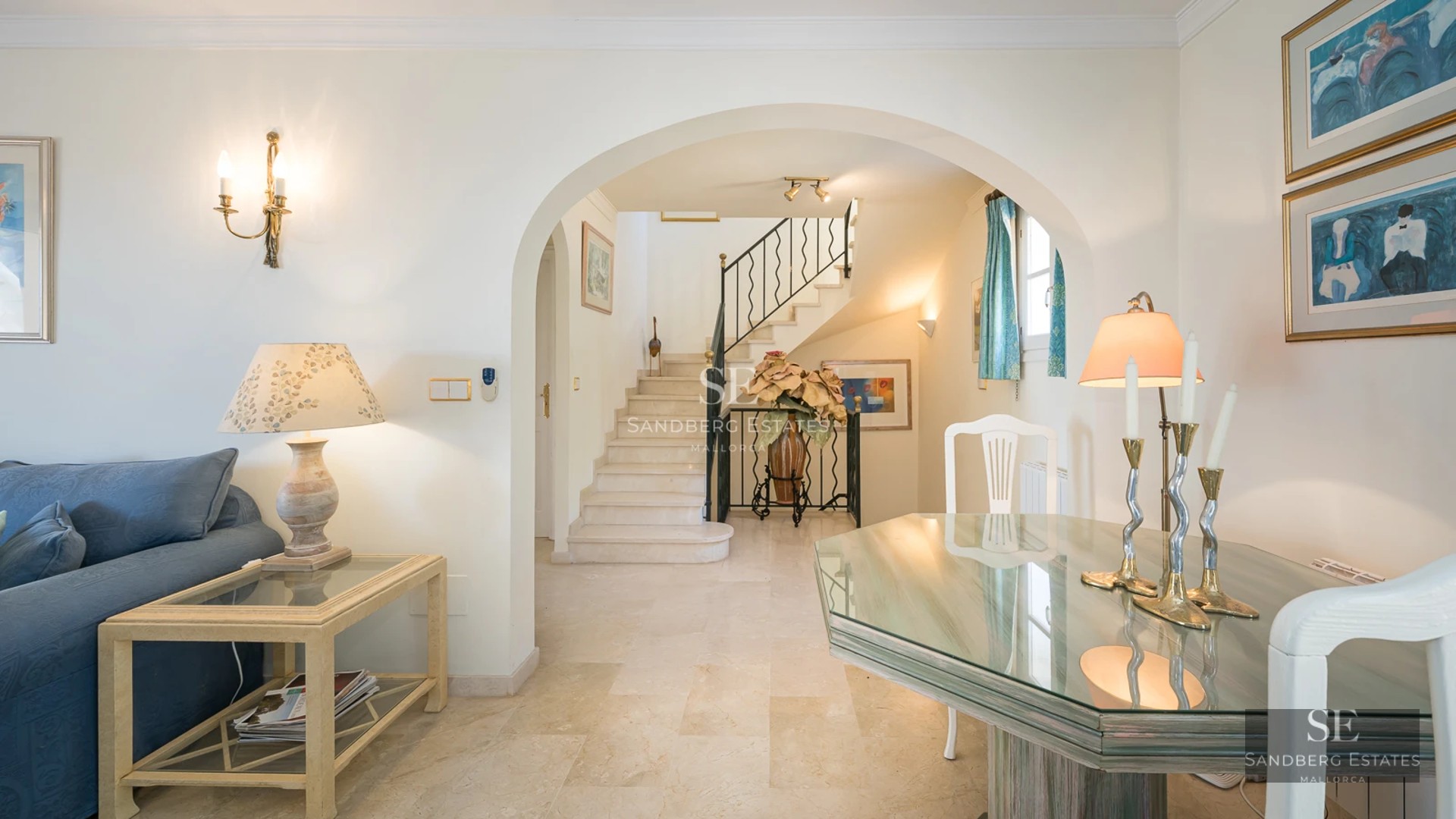 Exterior view of a modern villa with infinity pool, surrounded by greenery. Minimalist architecture with large windows.