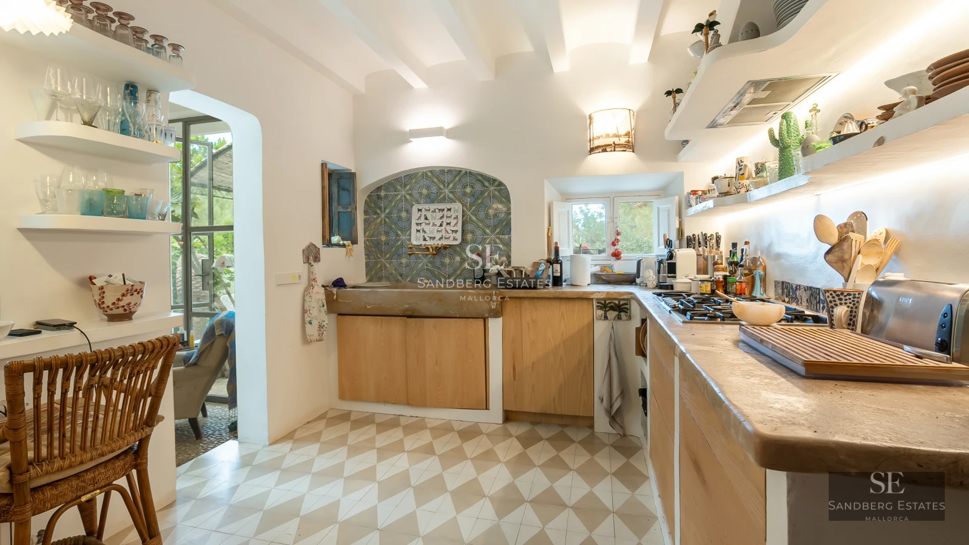 Exterior view of a modern villa featuring an infinity pool, spacious terraces, and minimalist architectural design. Abundant natural light.