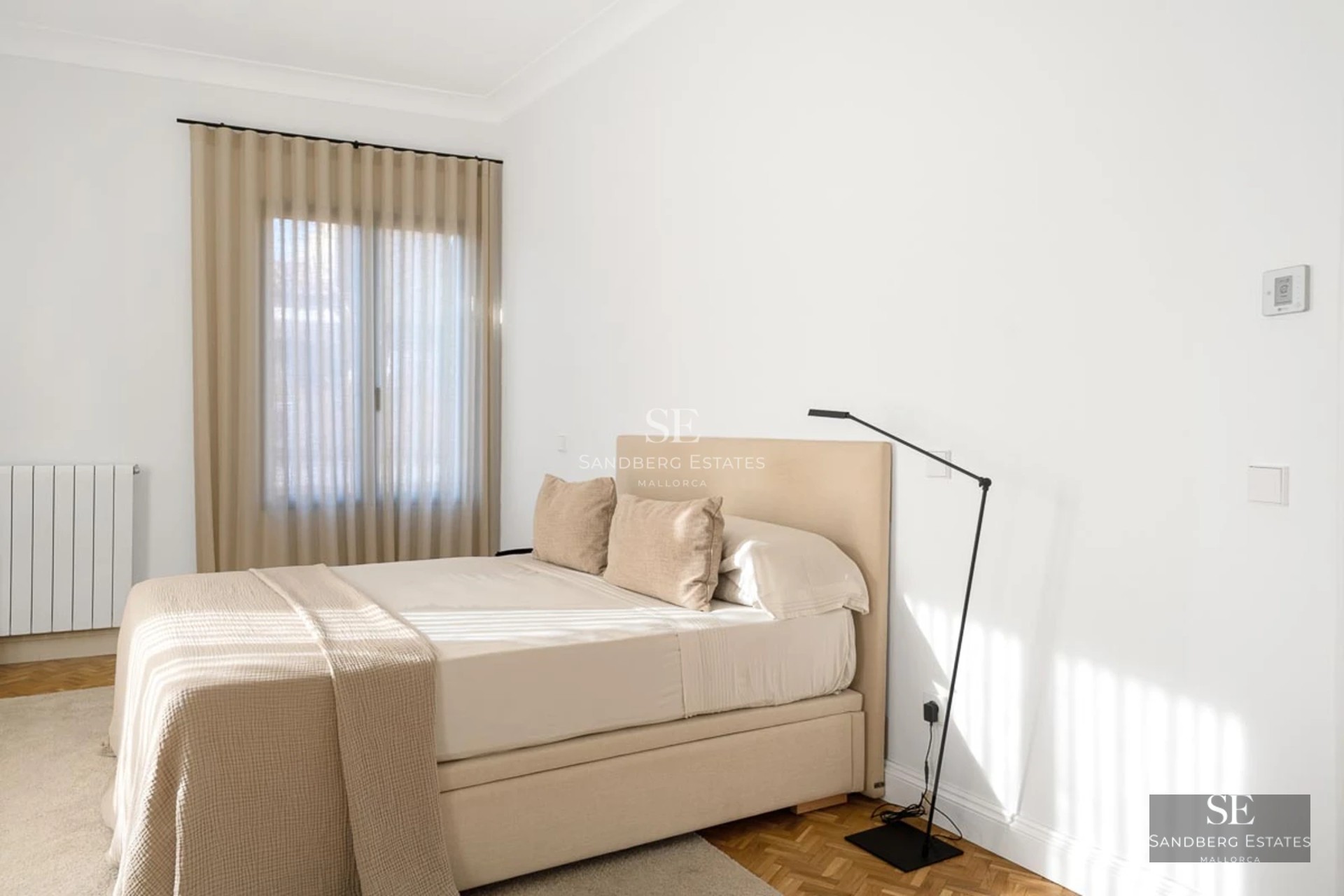 Spacious terrace with infinity pool and panoramic sea views. Modern design with wooden flooring and elegant furniture.