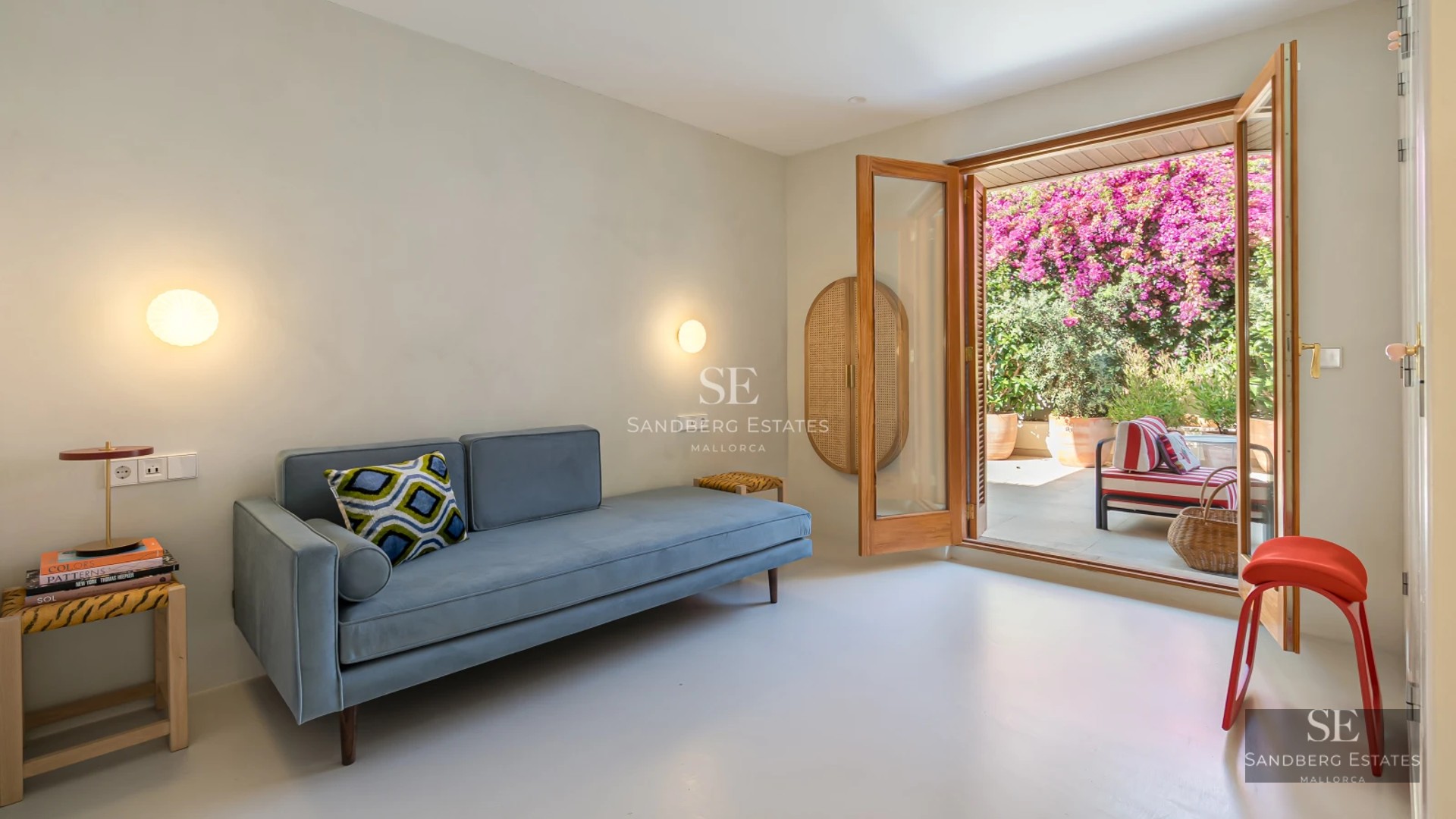 Exterior view of a modern villa featuring an infinity pool, lush garden, and expansive terraces. Minimalist architectural design.