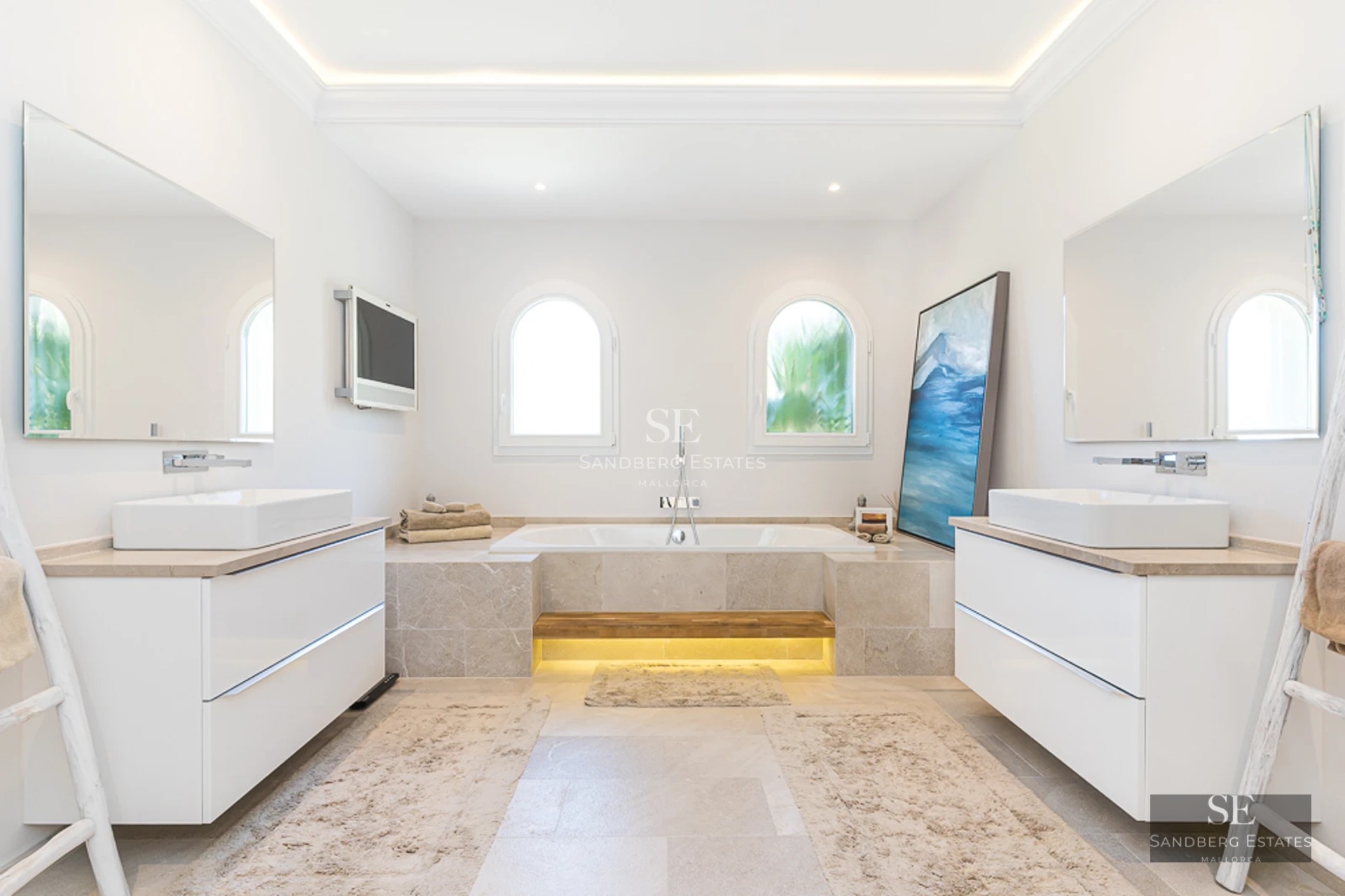 Exterior view of a modern villa with an infinity pool, lush garden, and minimalist architecture. White facade, large windows.