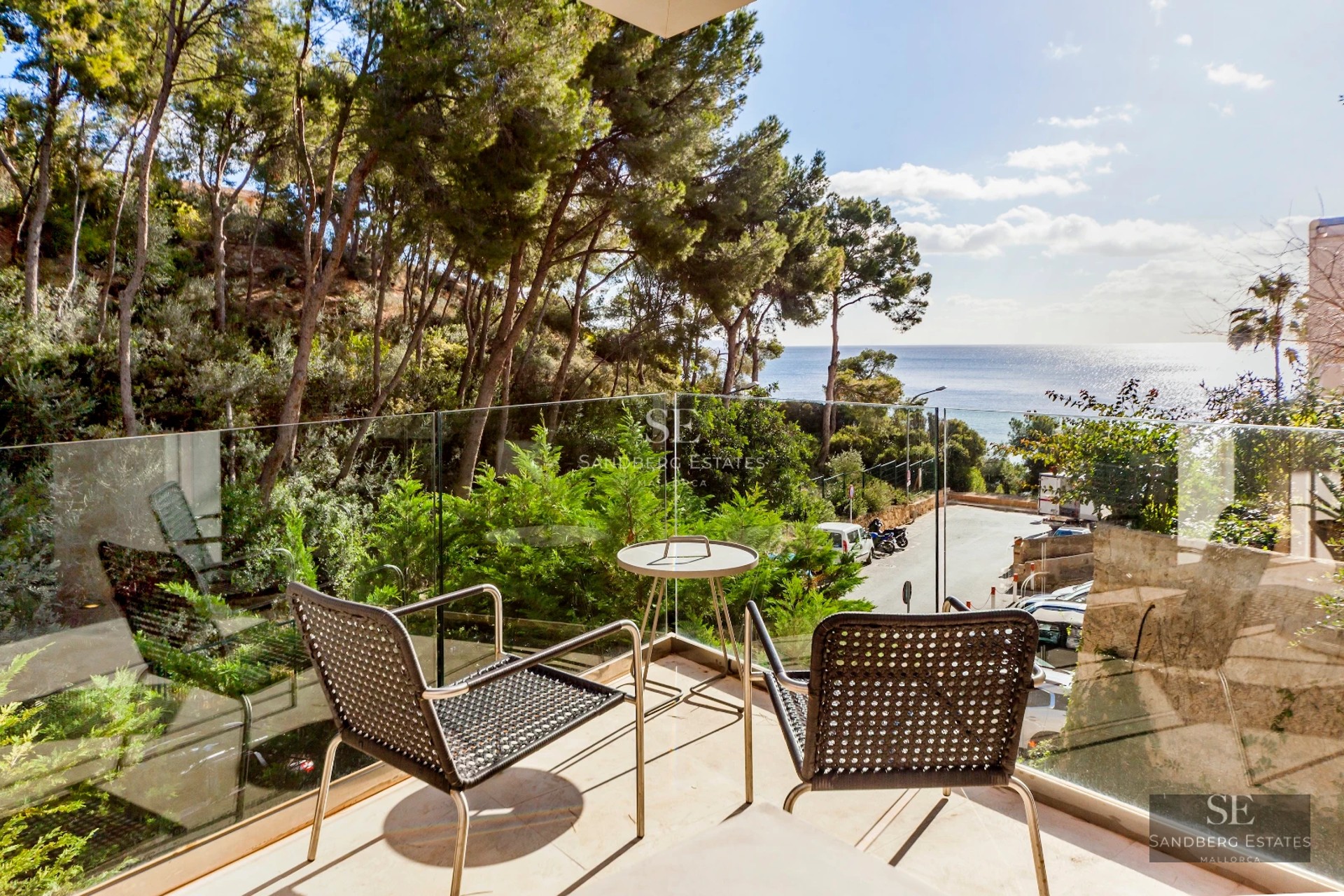 Spacious terrace with infinity pool, sea views. Modern design, elegant outdoor furniture and abundant natural light.