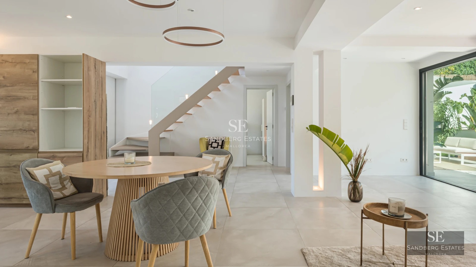 Spacious terrace with infinity pool, sea view, modern furniture, and minimalist design. Soft ambient lighting.