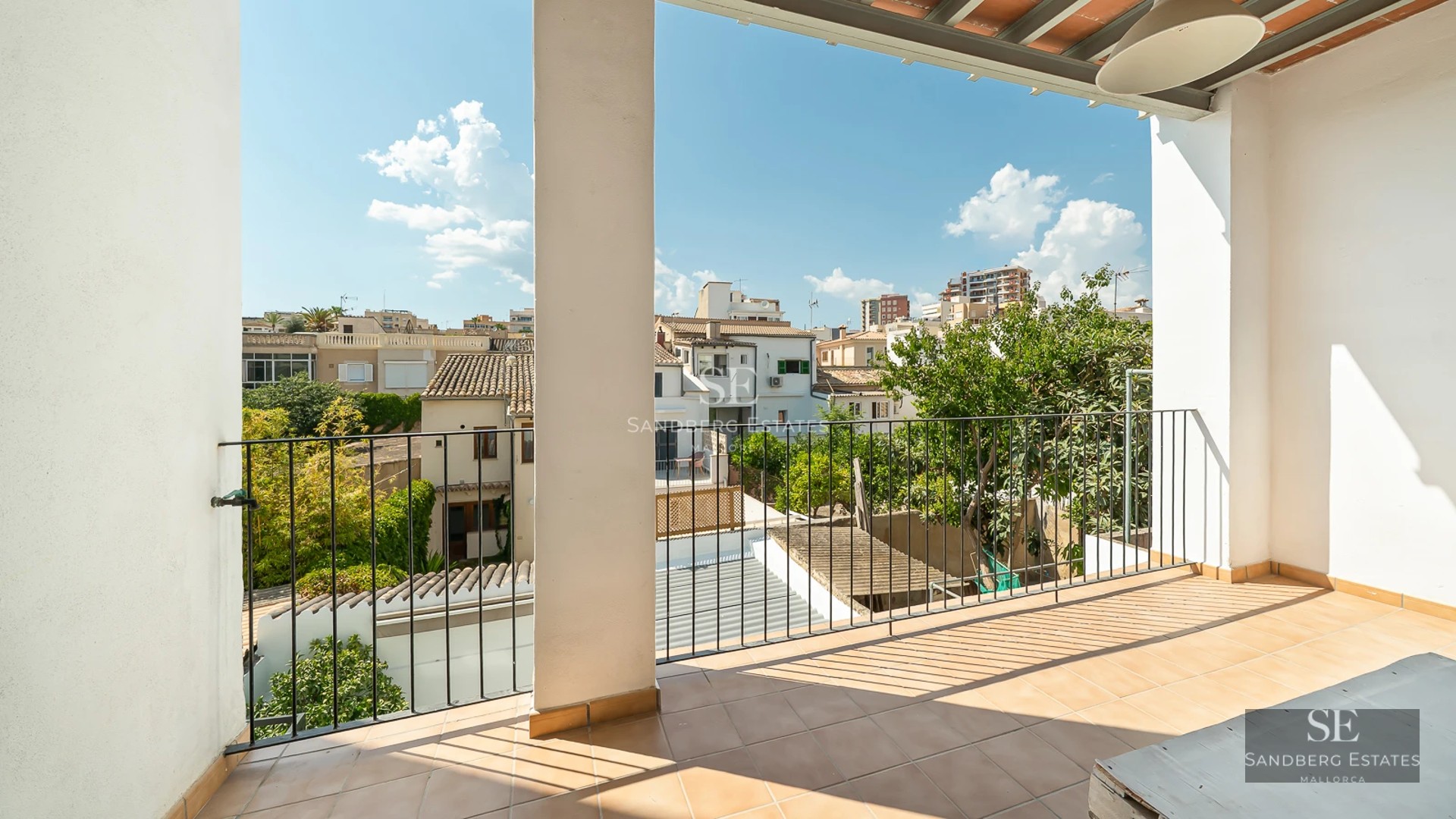Modern villa exterior featuring a pool, lush garden, and expansive terraces. Minimalist design and abundant natural light.
