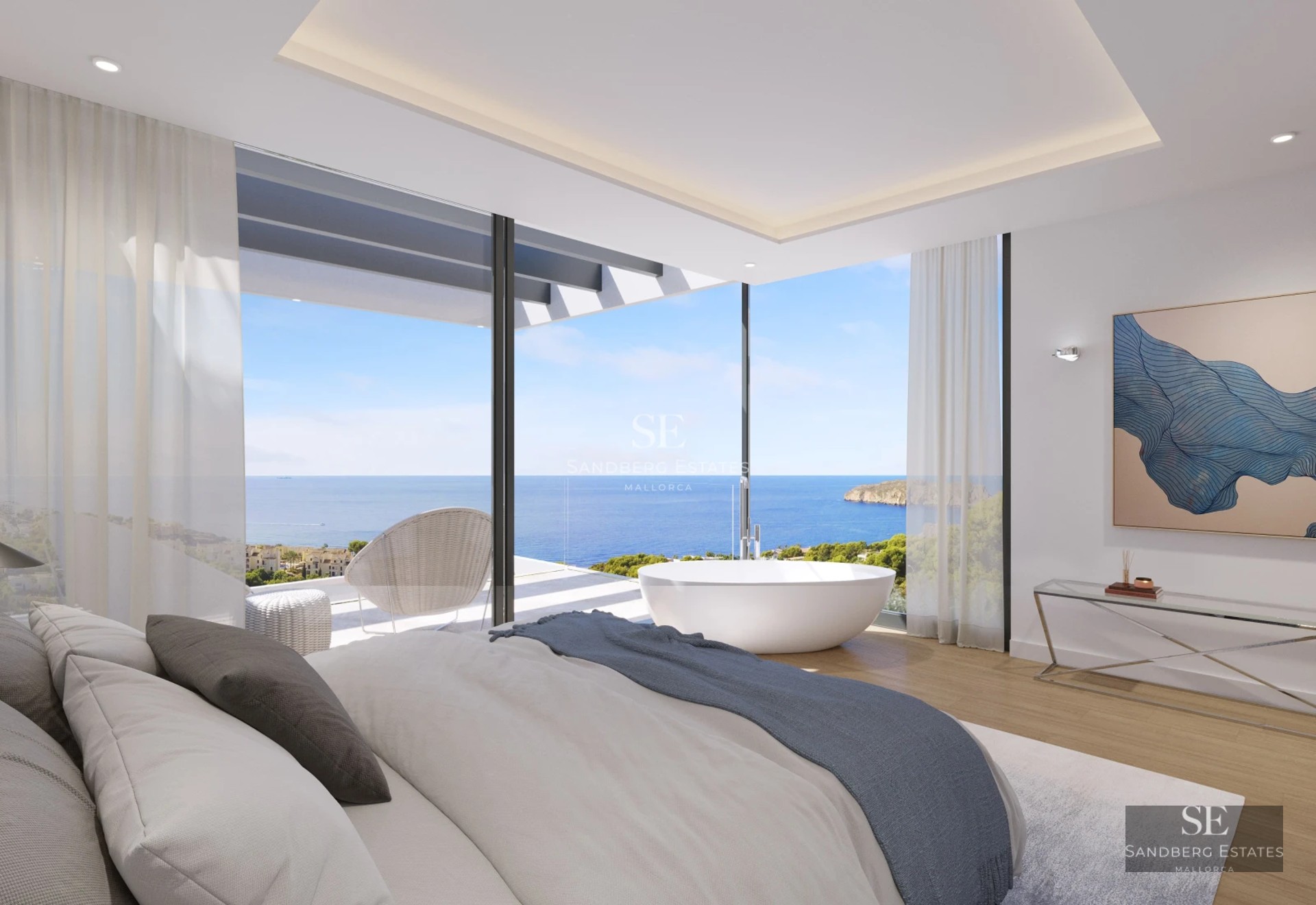 Spacious balcony with ocean view. Modern design, glass railing. Ideal for relaxing and enjoying the seascape.